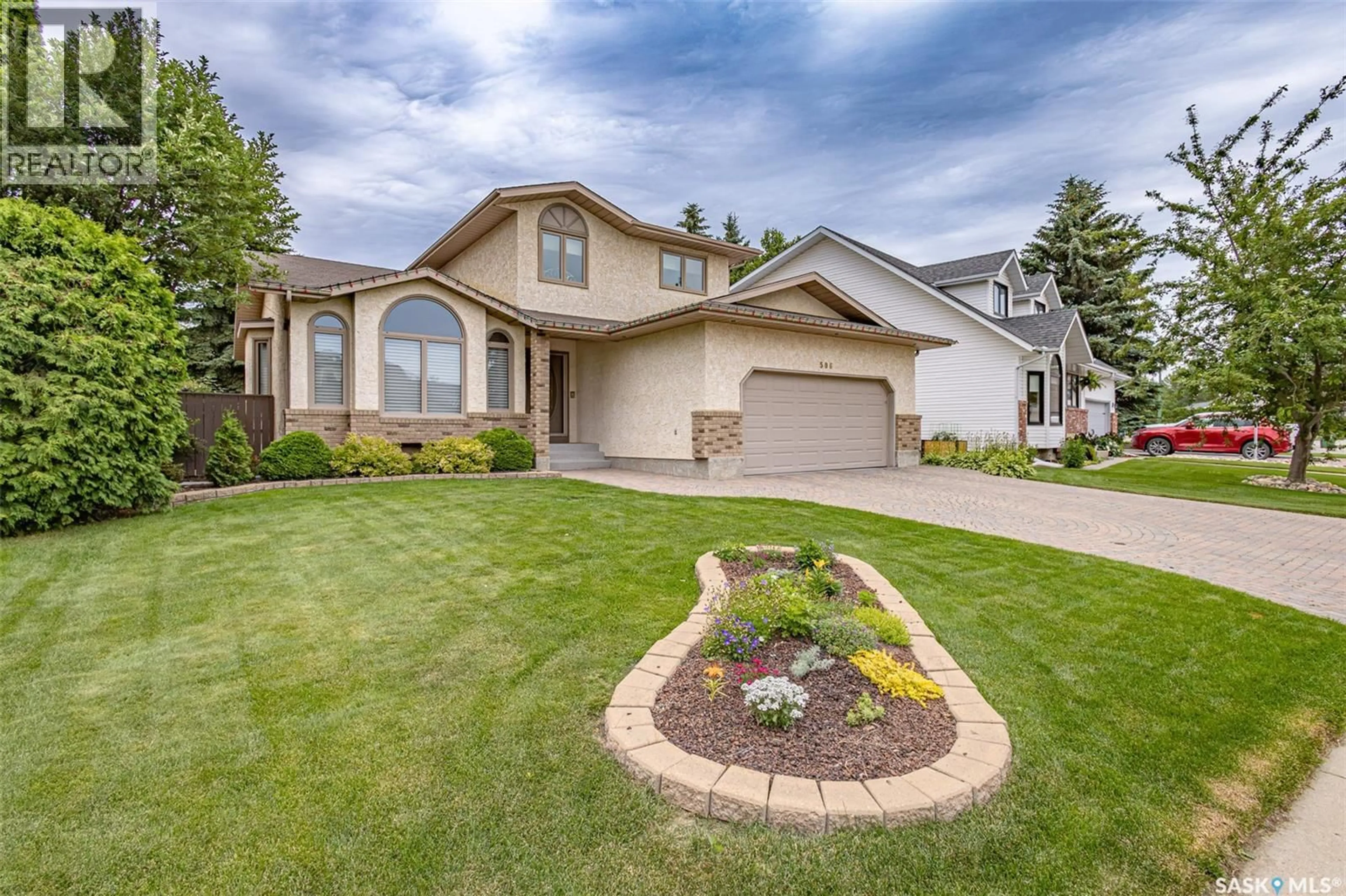 Home with vinyl exterior material, street for 506 FORSYTH CRESCENT, Saskatoon Saskatchewan S7N4H8