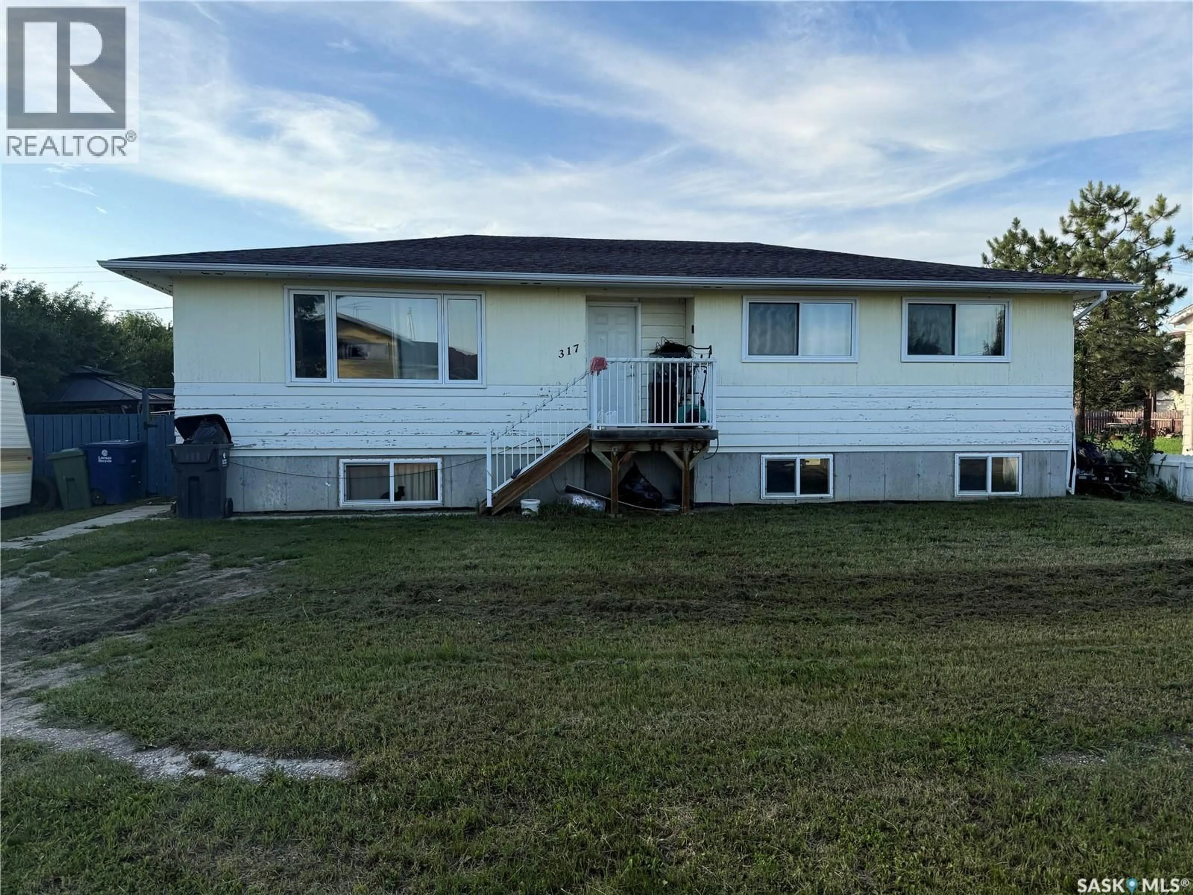 A pic from outside/outdoor area/front of a property/back of a property/a pic from drone, building for 317 CARSON STREET, Dundurn Saskatchewan S0K1K0