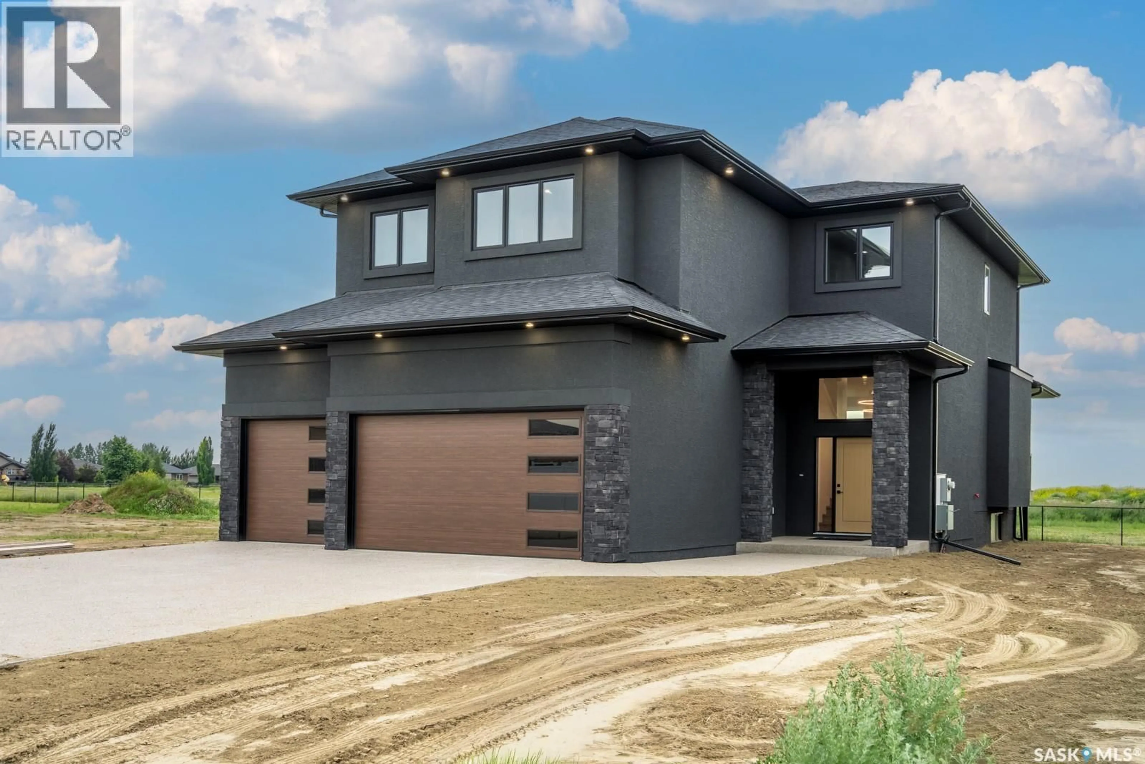 Home with brick exterior material, street for 23 HUBER DRIVE, Edenwold Rm No.158 Saskatchewan S4L0A7