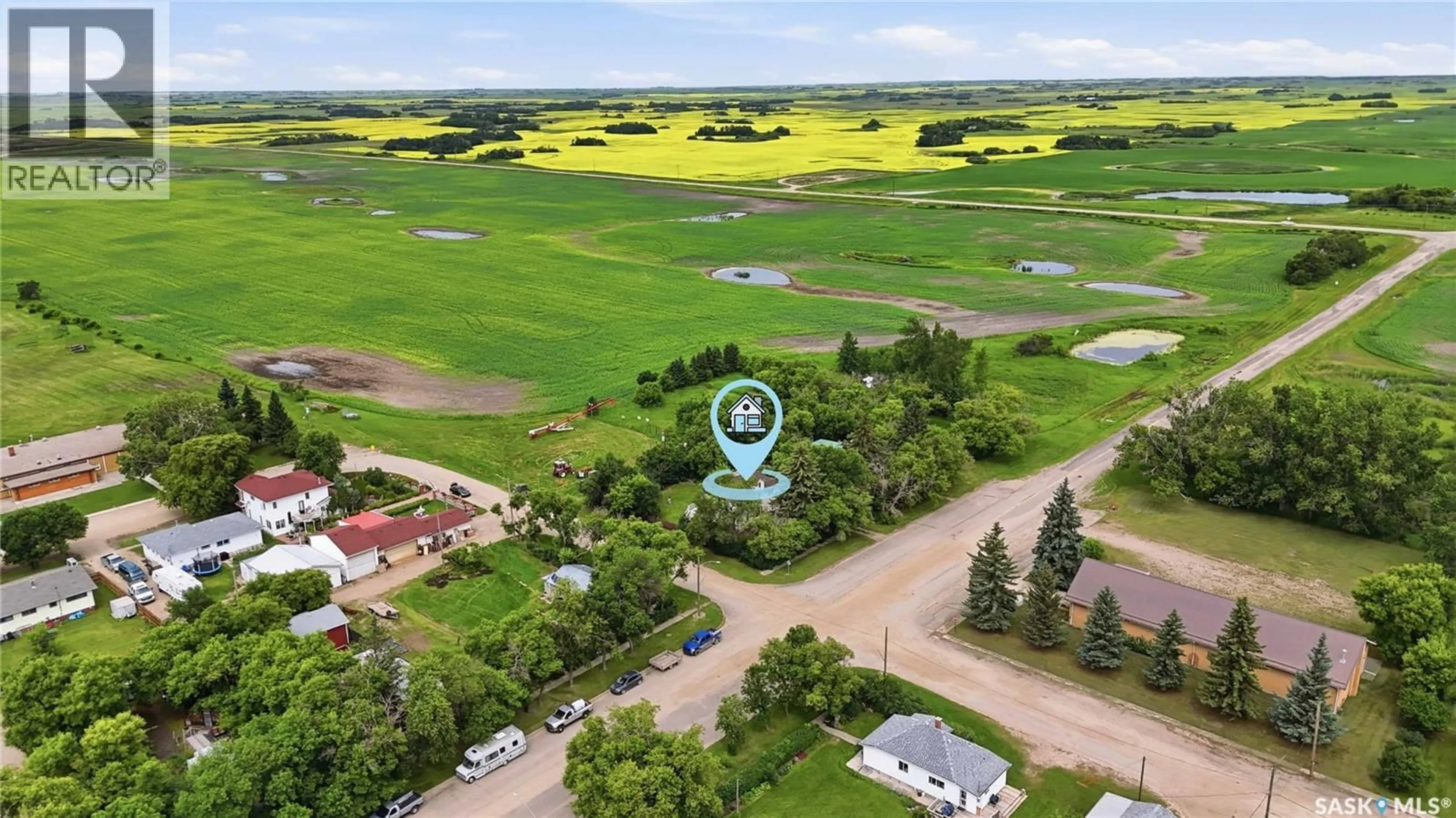 A pic from outside/outdoor area/front of a property/back of a property/a pic from drone, water/lake/river/ocean view for 300 MAIN STREET, Dysart Saskatchewan S0G1H0