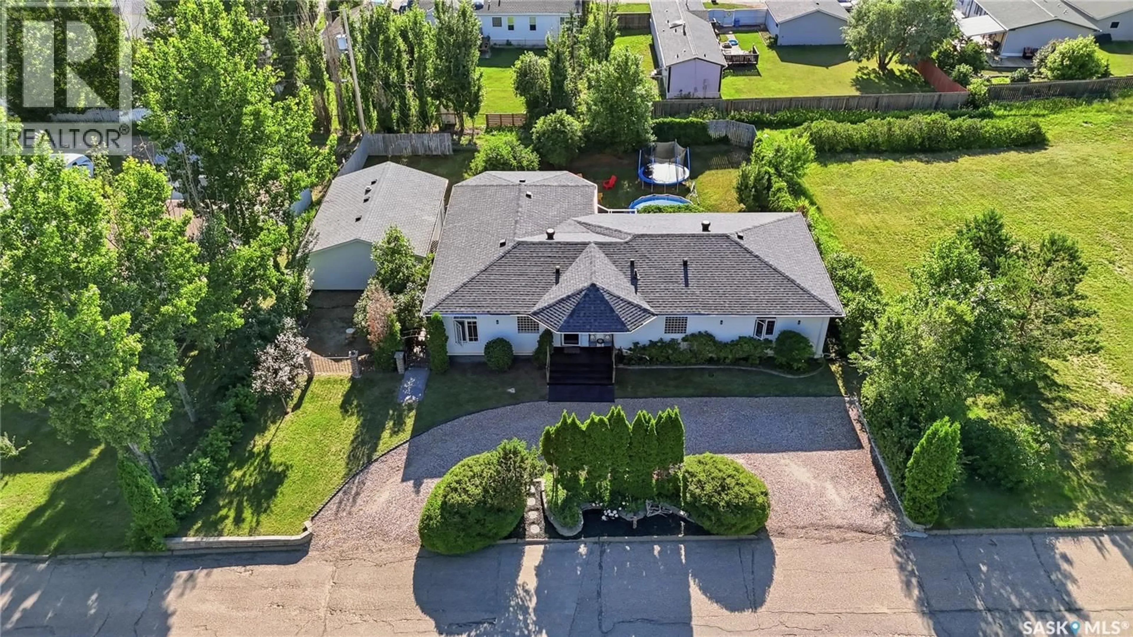 A pic from outside/outdoor area/front of a property/back of a property/a pic from drone, street for 308 3RD STREET, Delisle Saskatchewan S0L0P0