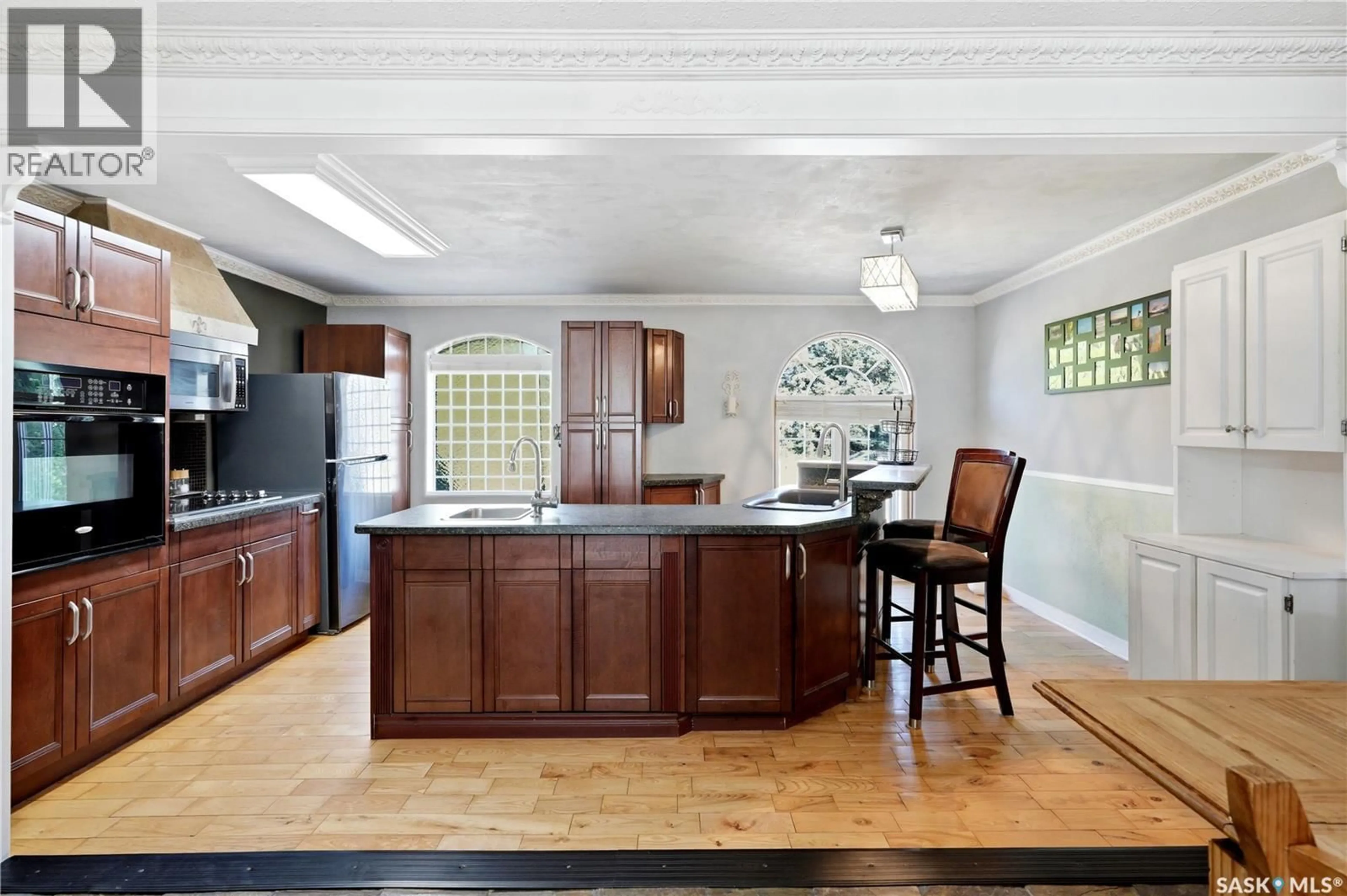 Open concept kitchen, unknown for 308 3RD STREET, Delisle Saskatchewan S0L0P0