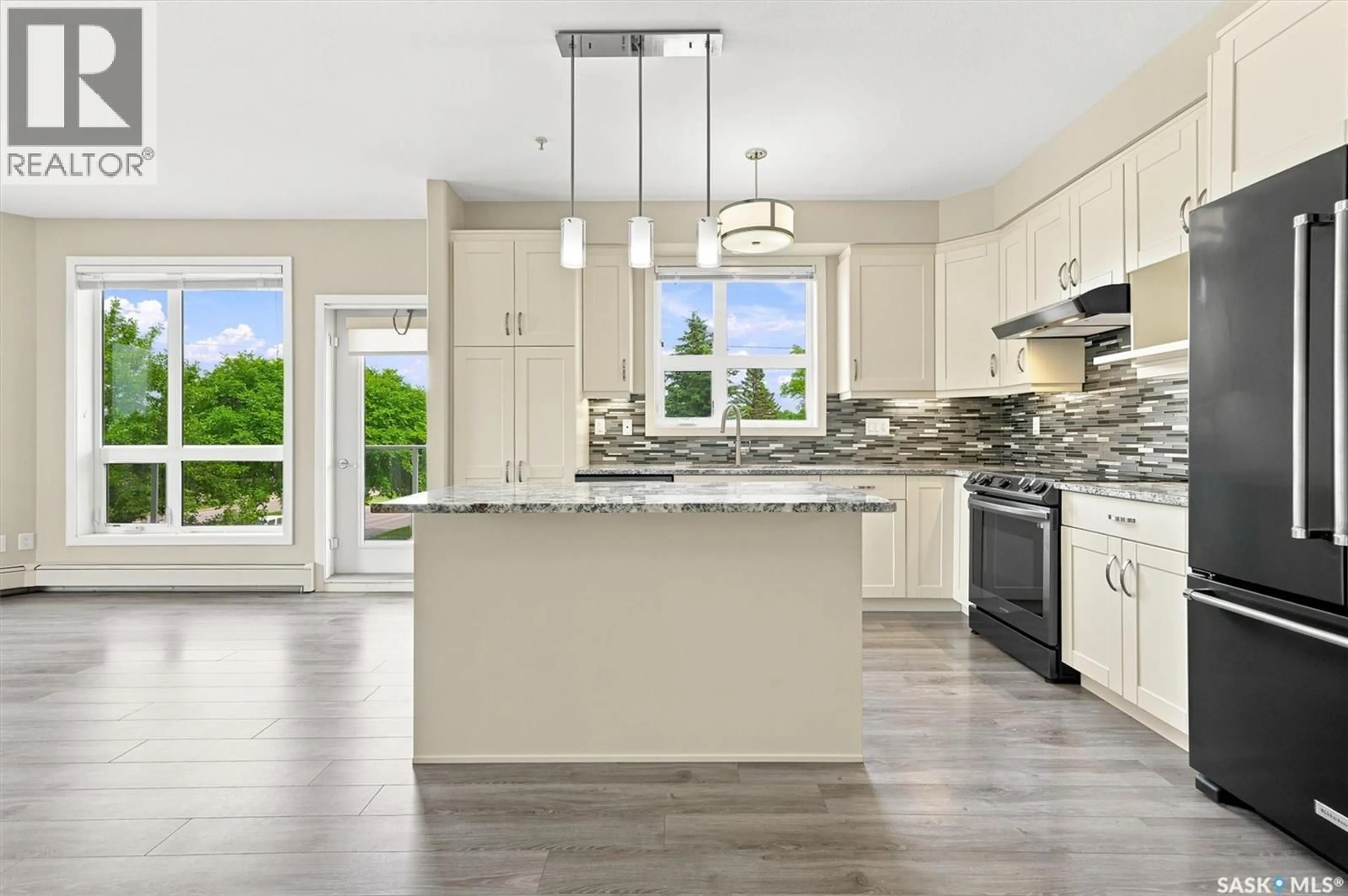 Open concept kitchen, ceramic/tile floor for 210 - 1015 MOSS AVENUE, Saskatoon Saskatchewan S7H4J3