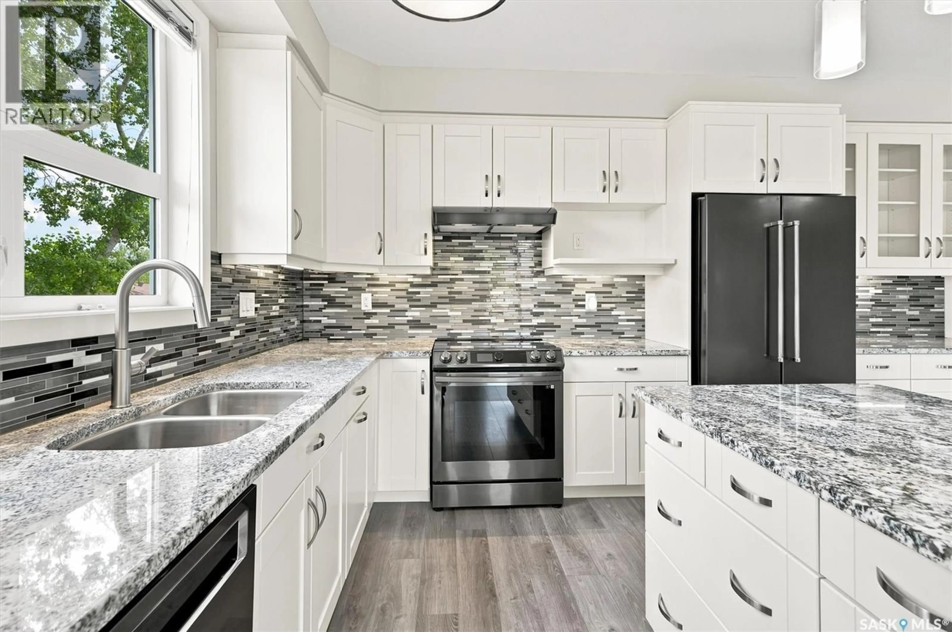 Open concept kitchen, ceramic/tile floor for 210 - 1015 MOSS AVENUE, Saskatoon Saskatchewan S7H4J3