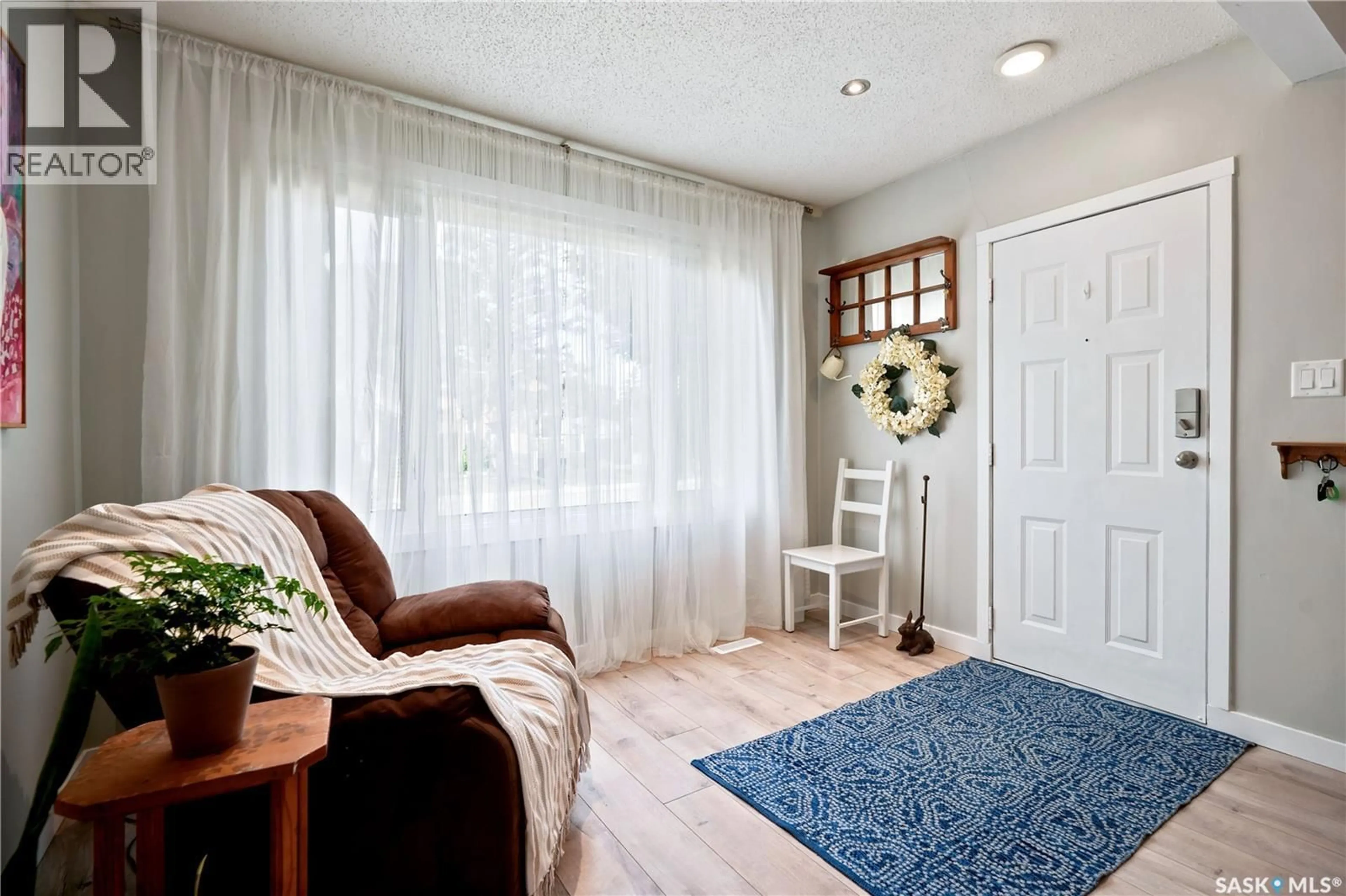 Living room with furniture, unknown for 2209 QUEEN STREET, Regina Saskatchewan S4T4C6