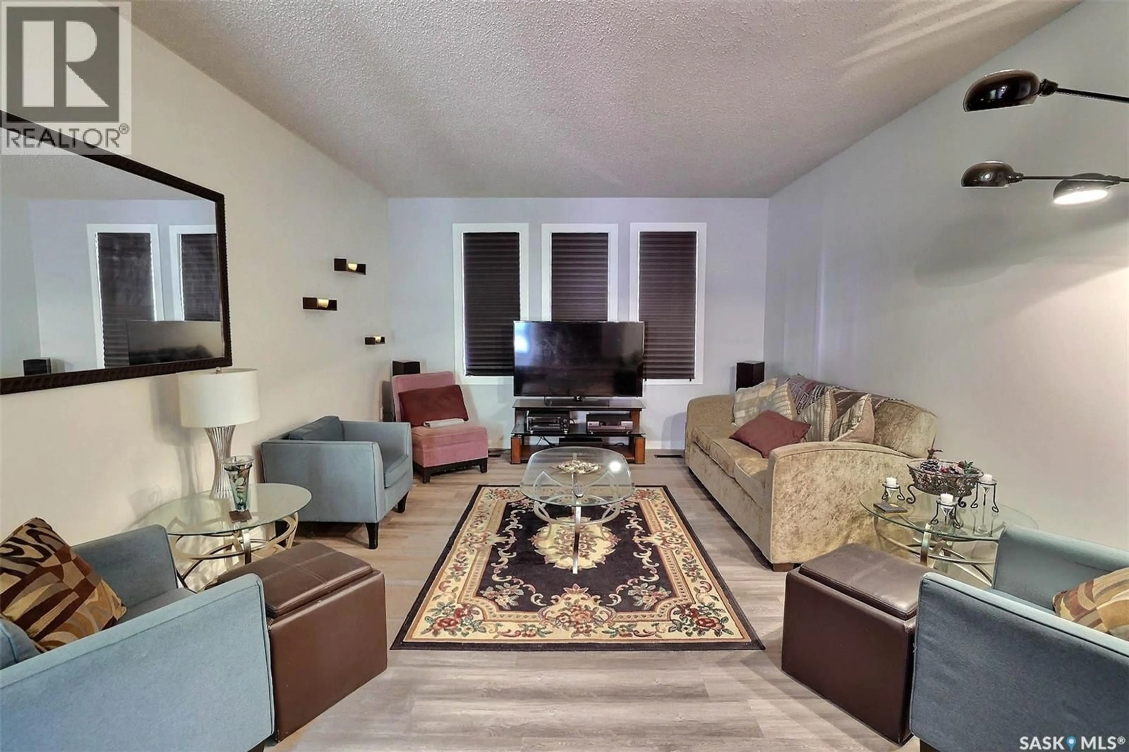 Living room with furniture, unknown for 122 EDENWOLD CRESCENT, Regina Saskatchewan S4R8A3