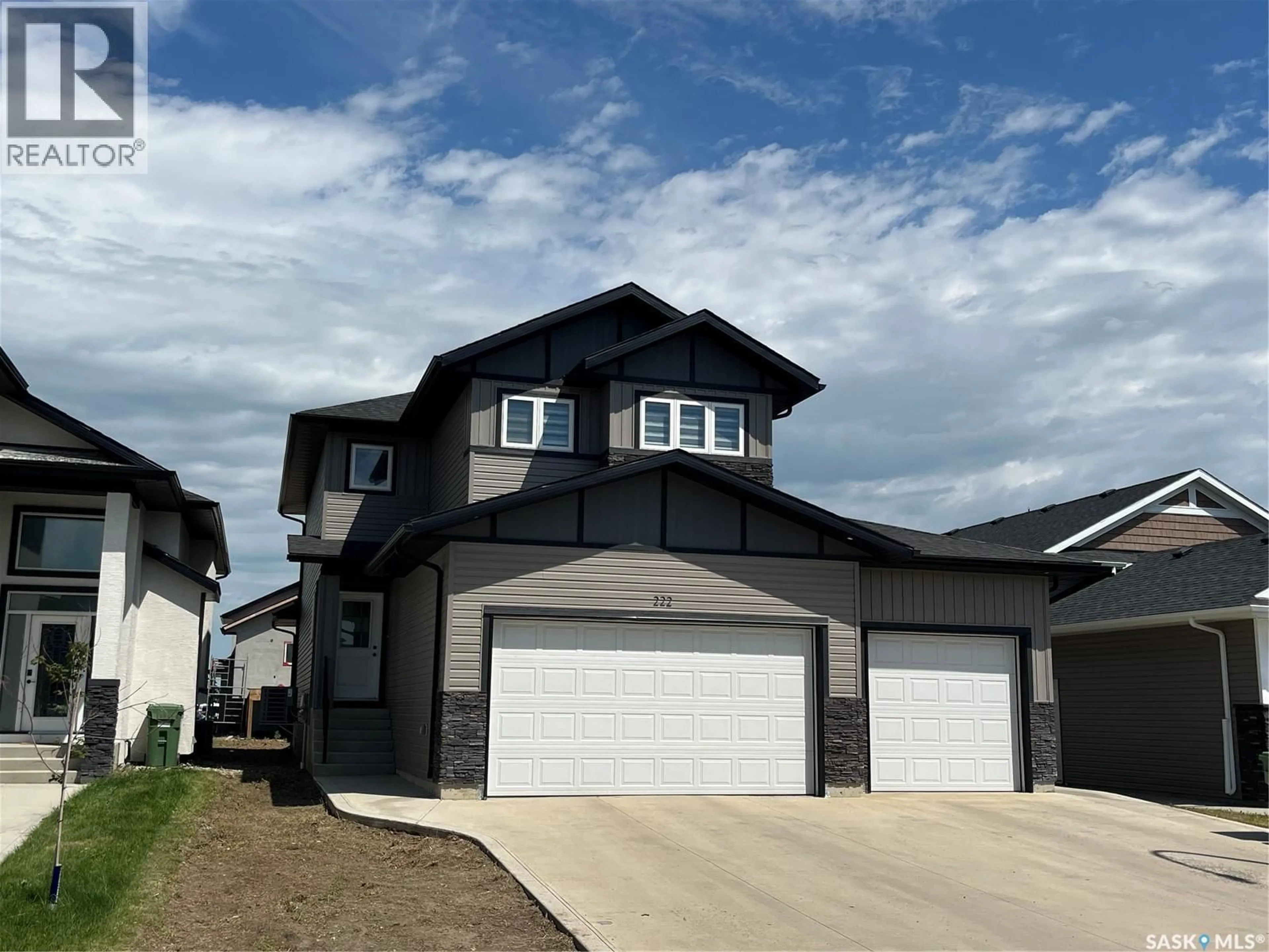 Home with vinyl exterior material, street for 222 NIGHTINGALE ROAD, Saskatoon Saskatchewan S7L6Y1