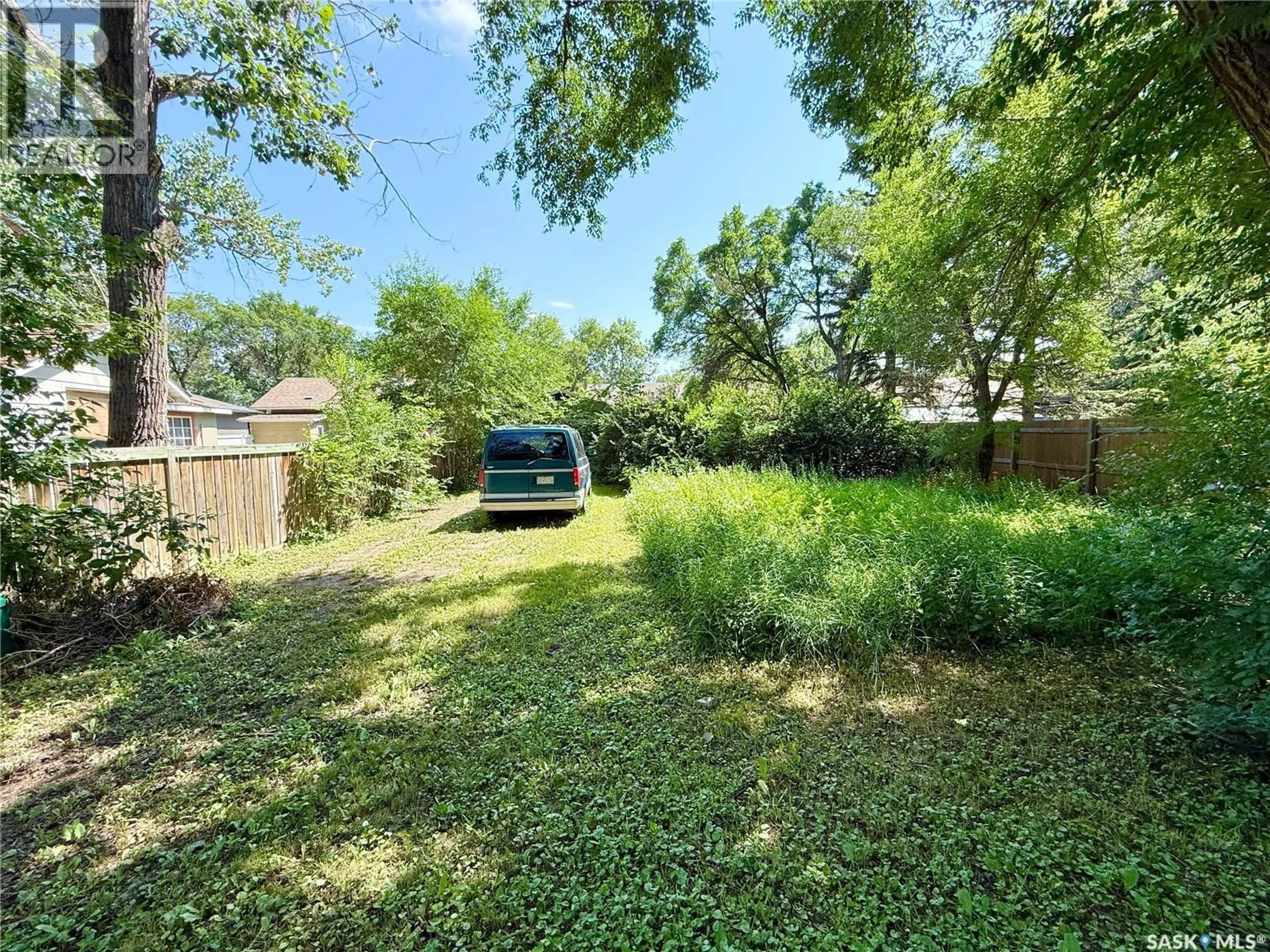 A pic from outside/outdoor area/front of a property/back of a property/a pic from drone, unknown for 1117 HARTNEY AVENUE, Weyburn Saskatchewan S4H0L9