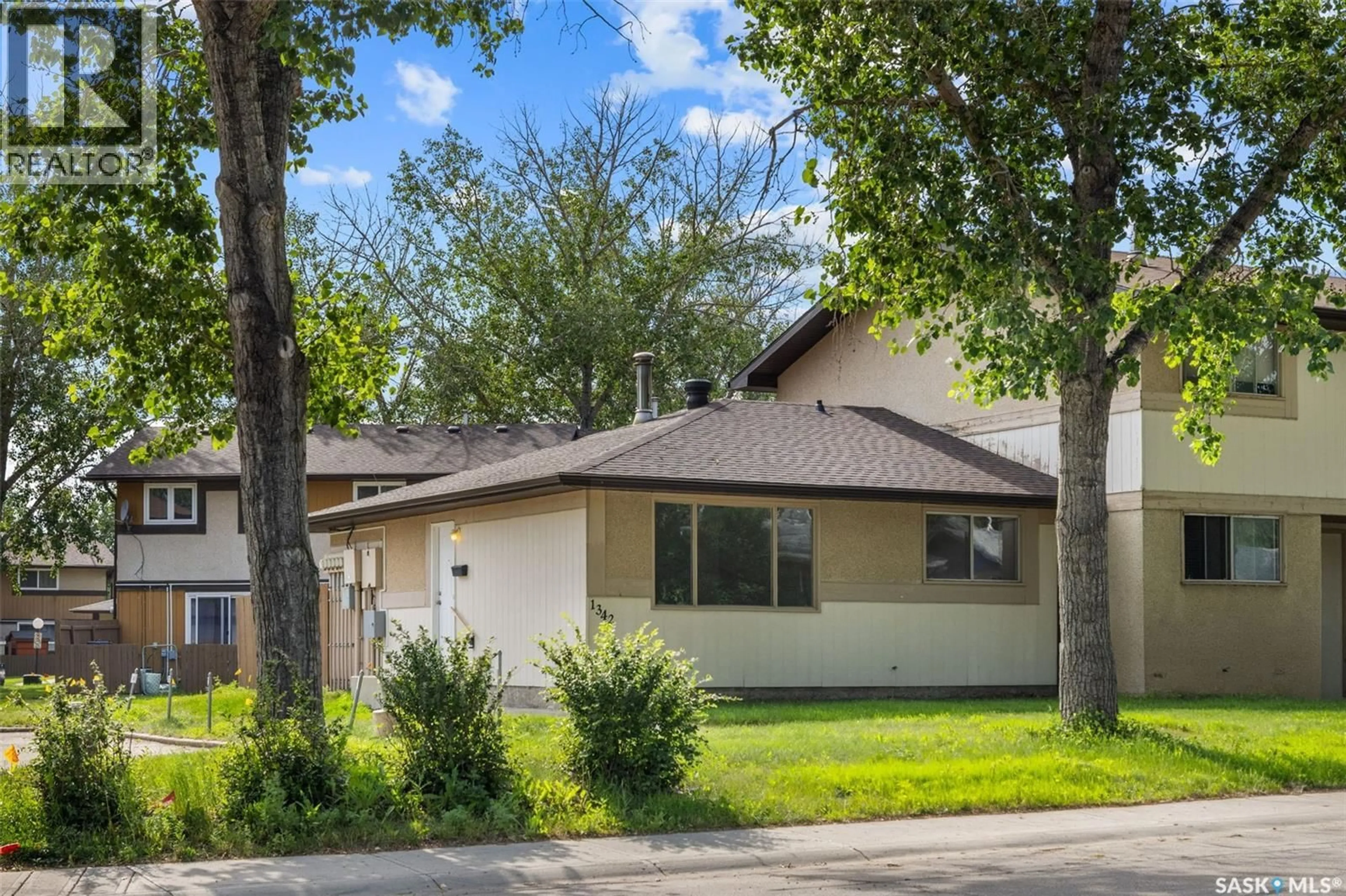 Home with vinyl exterior material, street for 1342 BROWN STREET, Regina Saskatchewan S4N5M3
