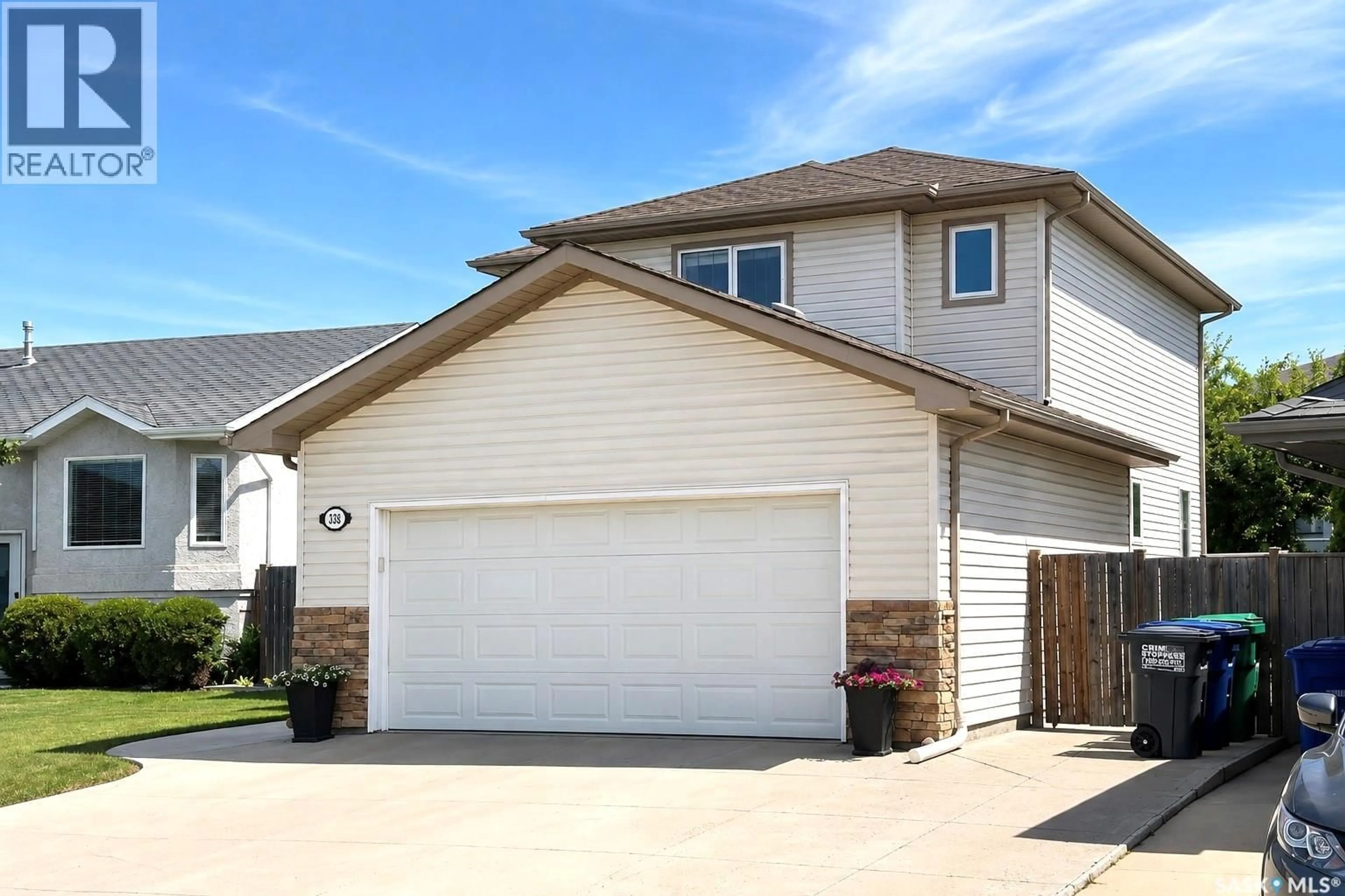 Home with vinyl exterior material, street for 338 STENSRUD ROAD, Saskatoon Saskatchewan S7W1B4