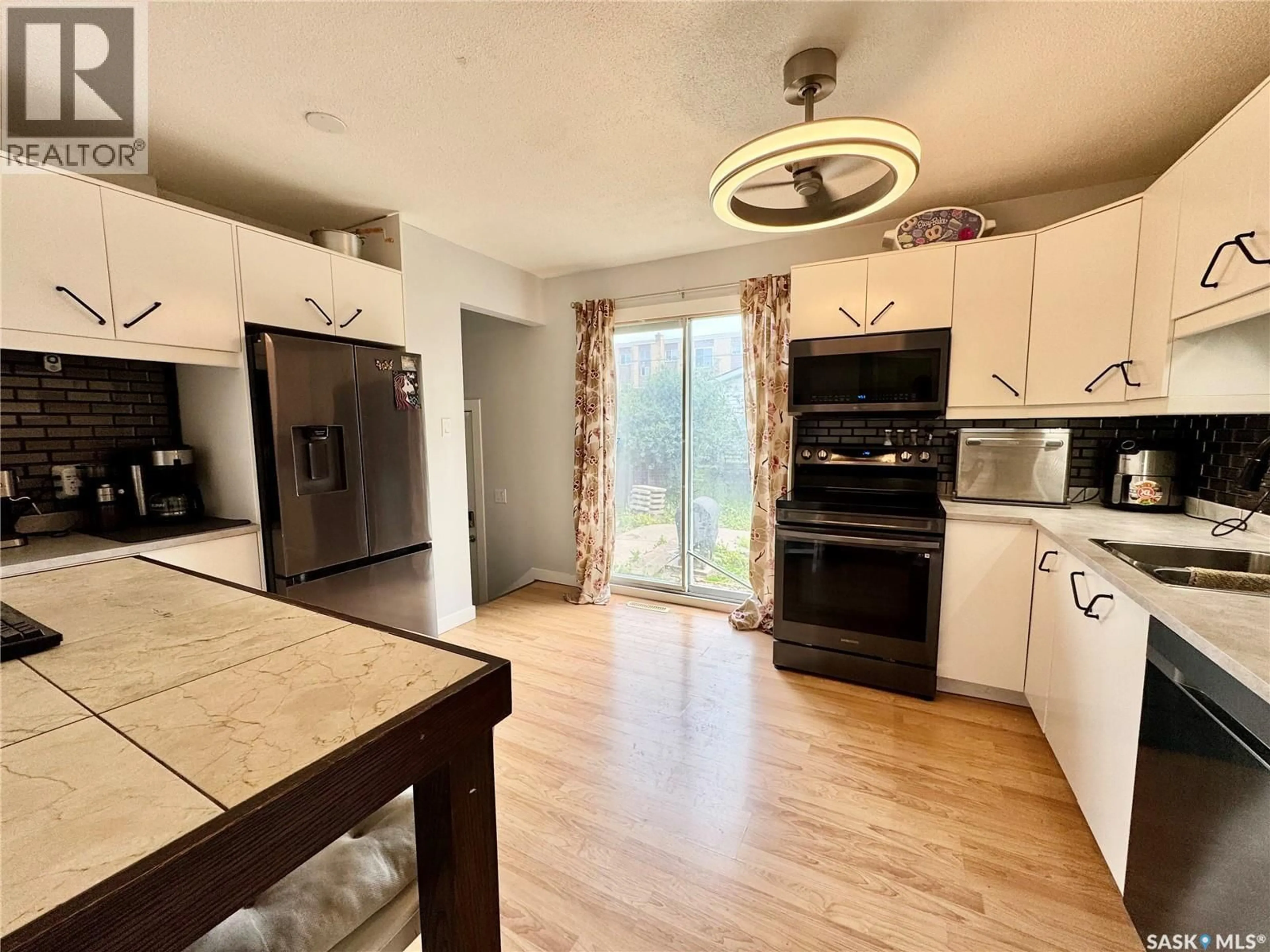 Open concept kitchen, unknown for 553 26TH STREET, Prince Albert Saskatchewan S6V1V4