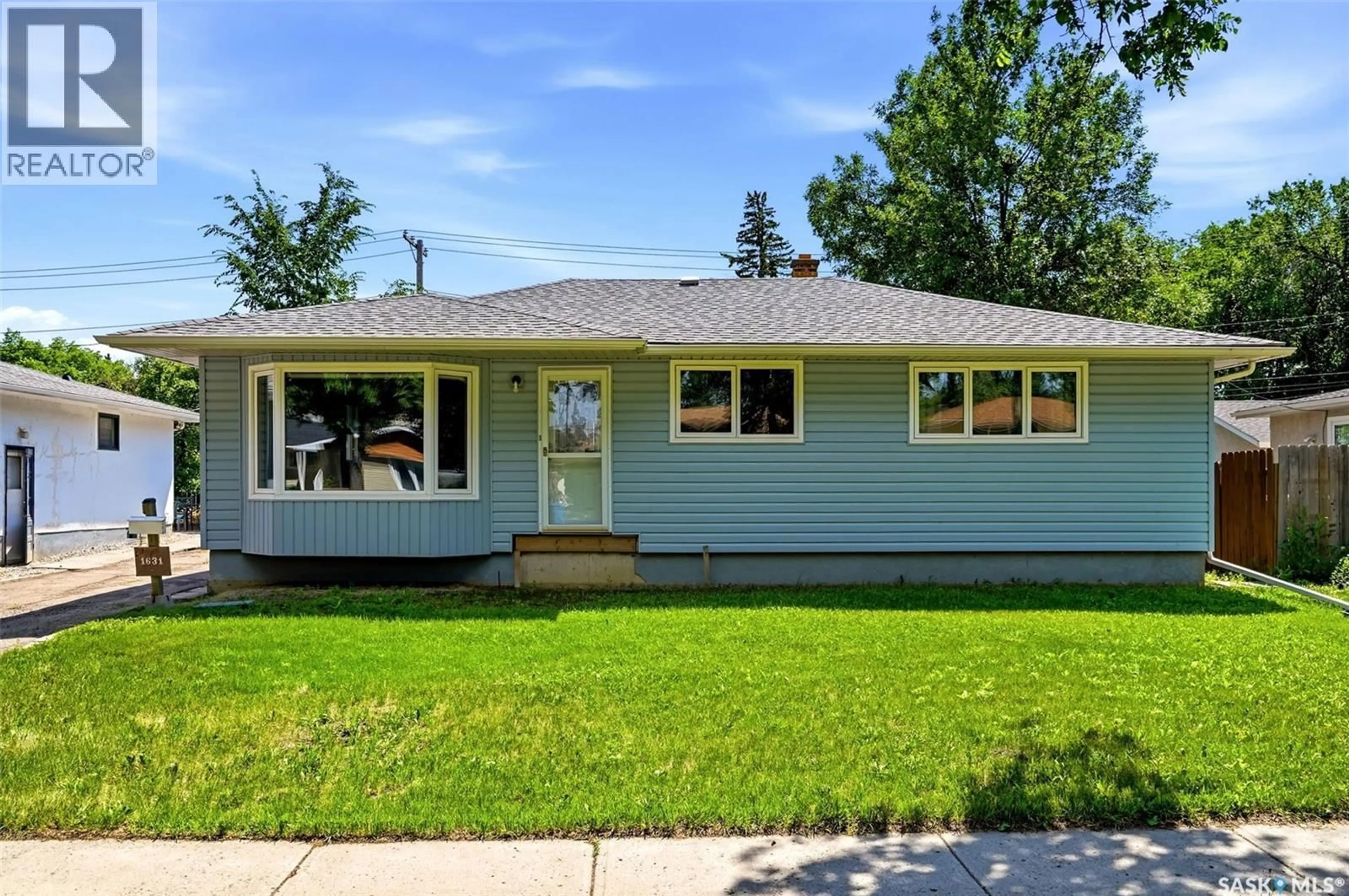 Home with vinyl exterior material, street for 1631 MACPHERSON AVENUE, Regina Saskatchewan S4S4E1