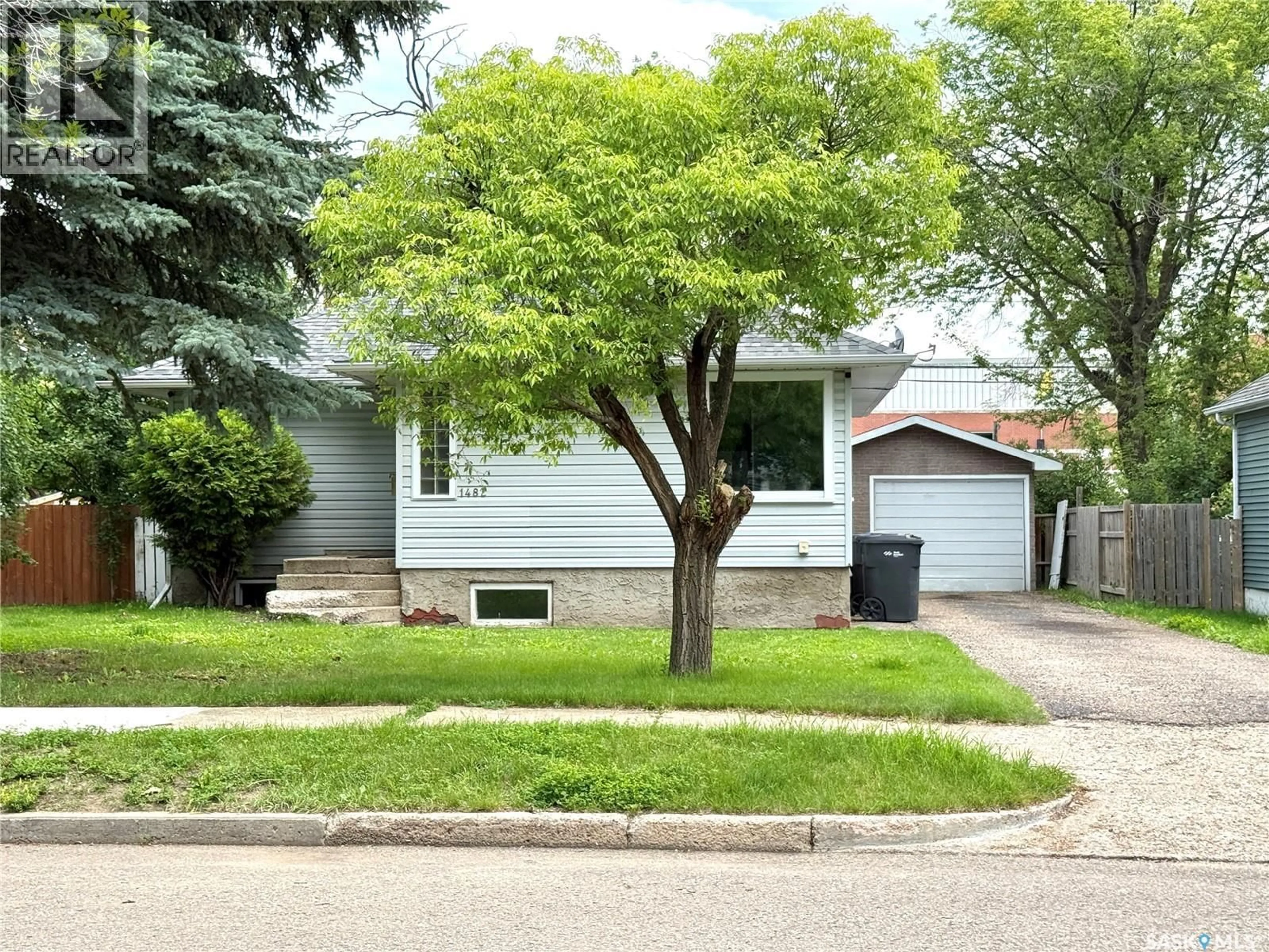 Home with vinyl exterior material, street for 1482 95TH STREET, North Battleford Saskatchewan S9A0G6