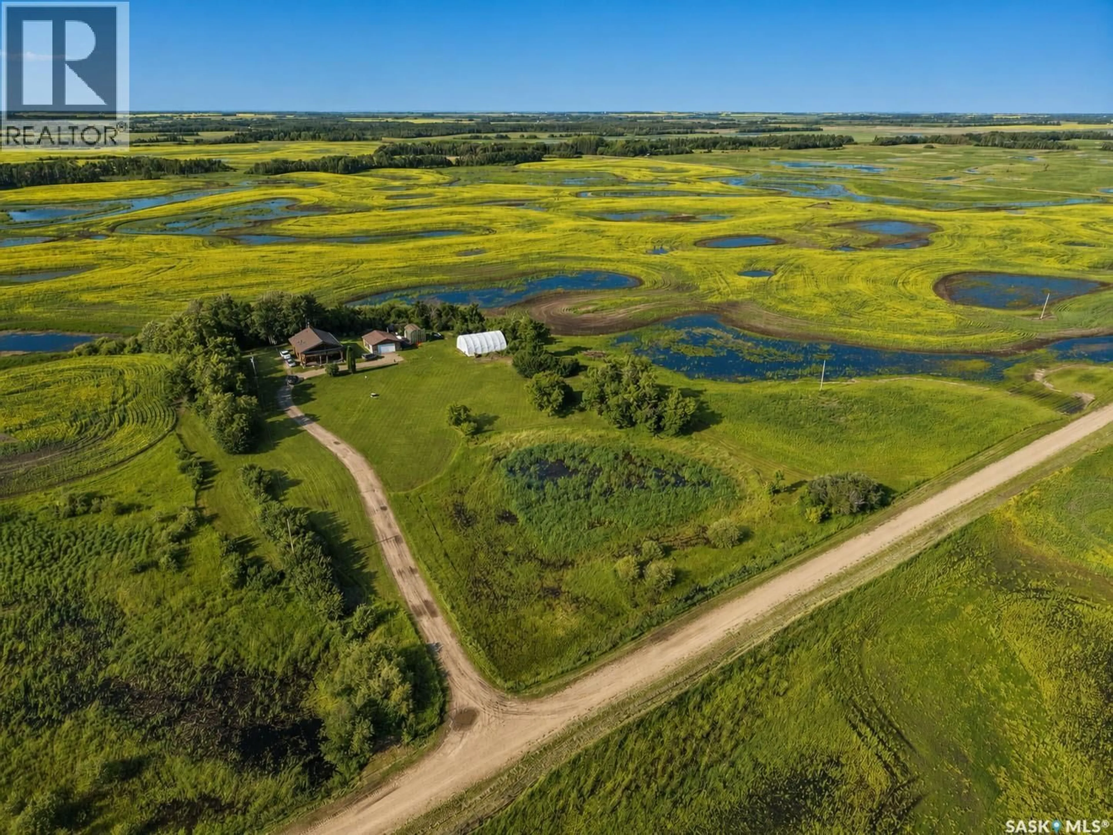 A pic from outside/outdoor area/front of a property/back of a property/a pic from drone, water/lake/river/ocean view for PULP HAUL ACREAGE, Buckland Rm No. 491 Saskatchewan S6V5R2