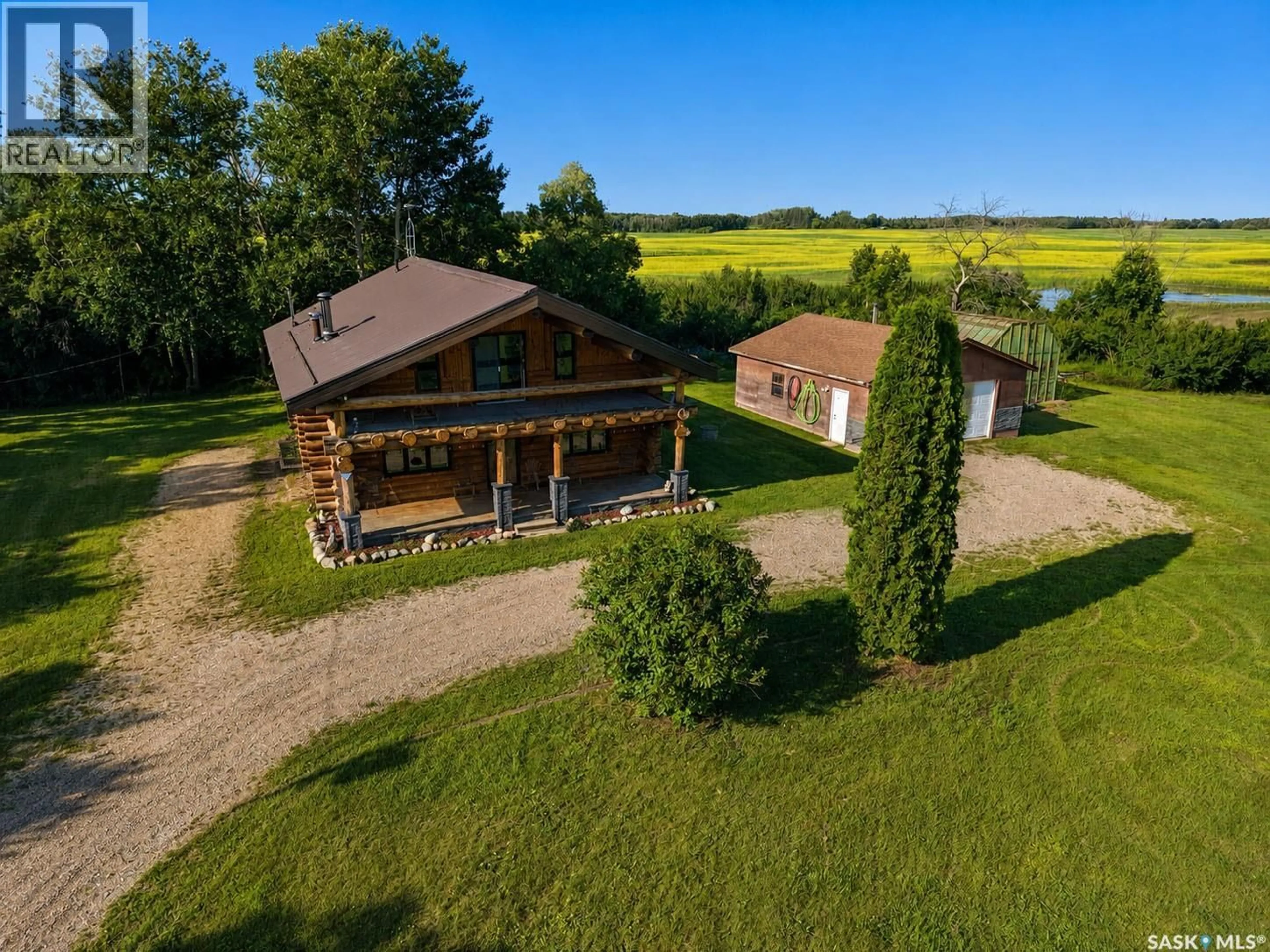 A pic from outside/outdoor area/front of a property/back of a property/a pic from drone, building for PULP HAUL ACREAGE, Buckland Rm No. 491 Saskatchewan S6V5R2