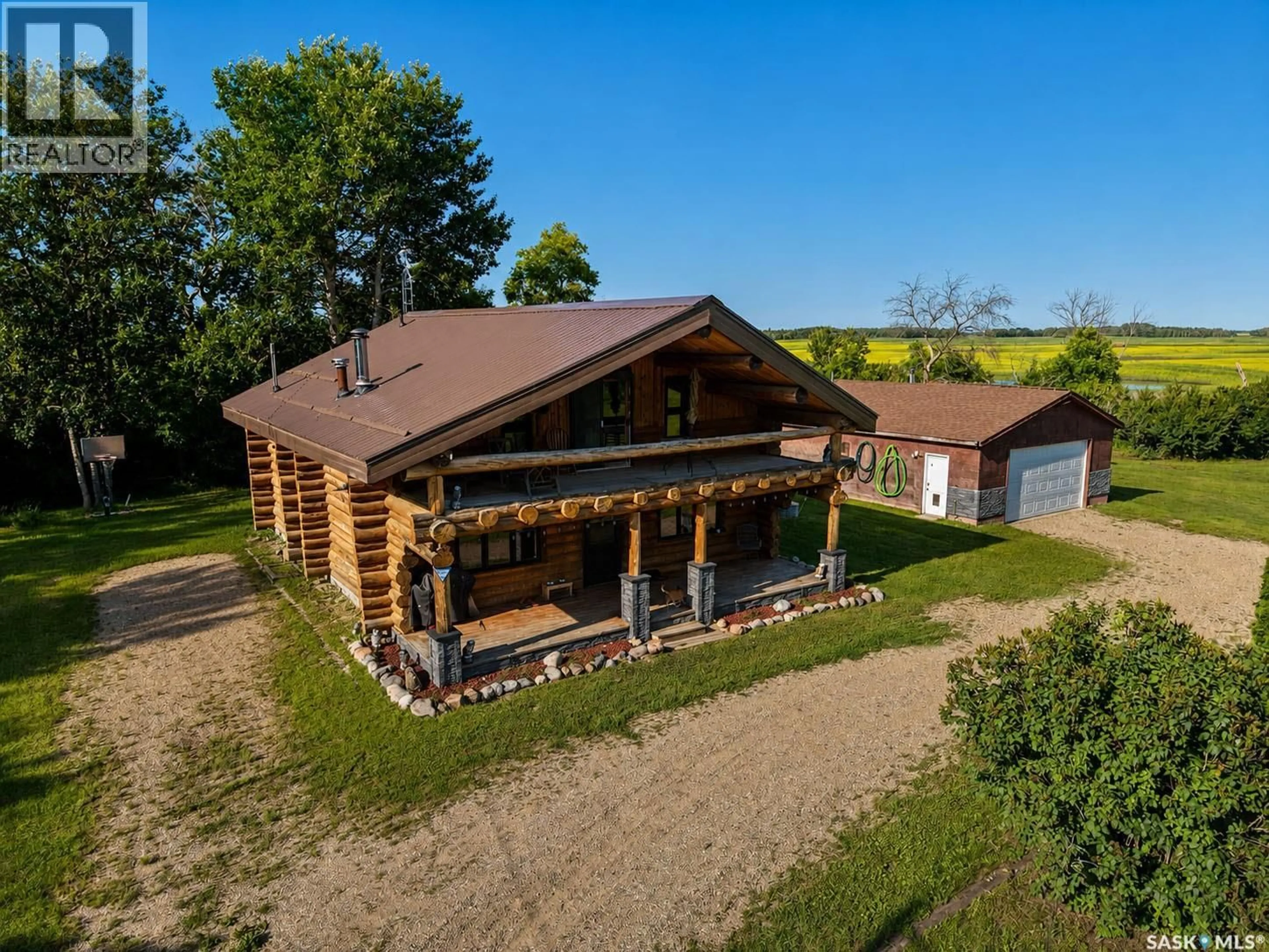 A pic from outside/outdoor area/front of a property/back of a property/a pic from drone, building for PULP HAUL ACREAGE, Buckland Rm No. 491 Saskatchewan S6V5R2