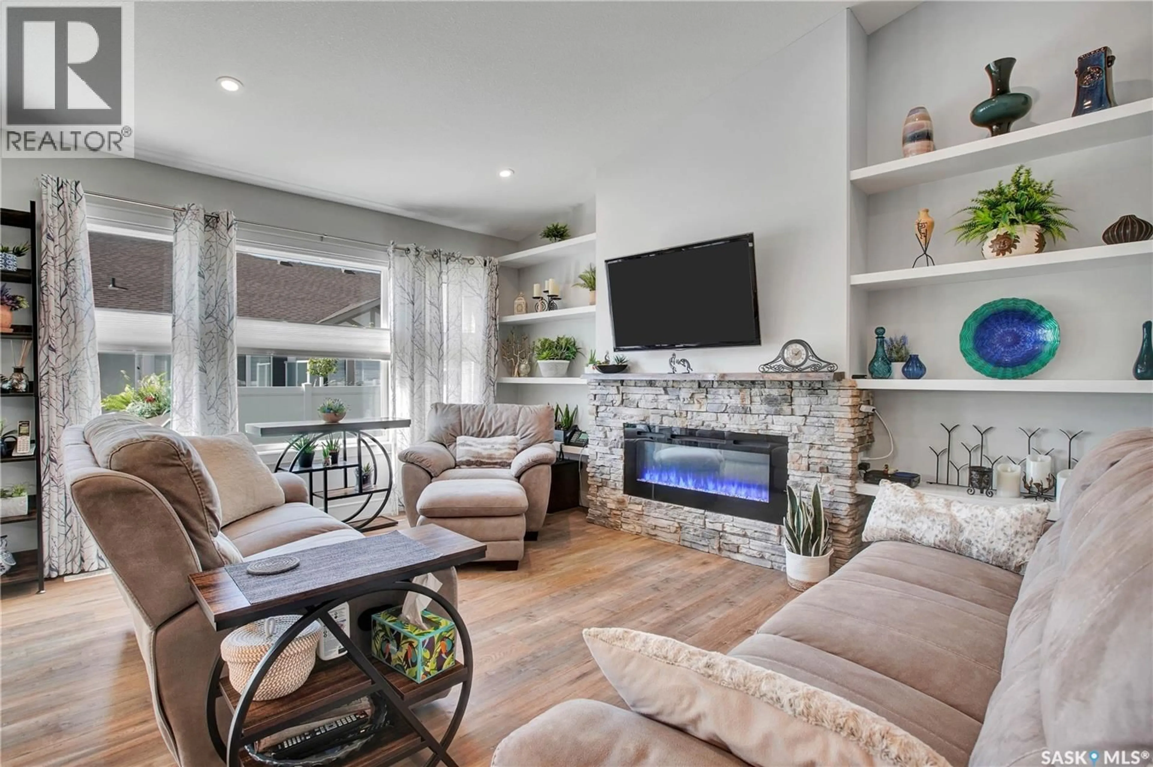 Living room with furniture, unknown for 4 437 PALMER CRESCENT, Warman Saskatchewan S0K4S1