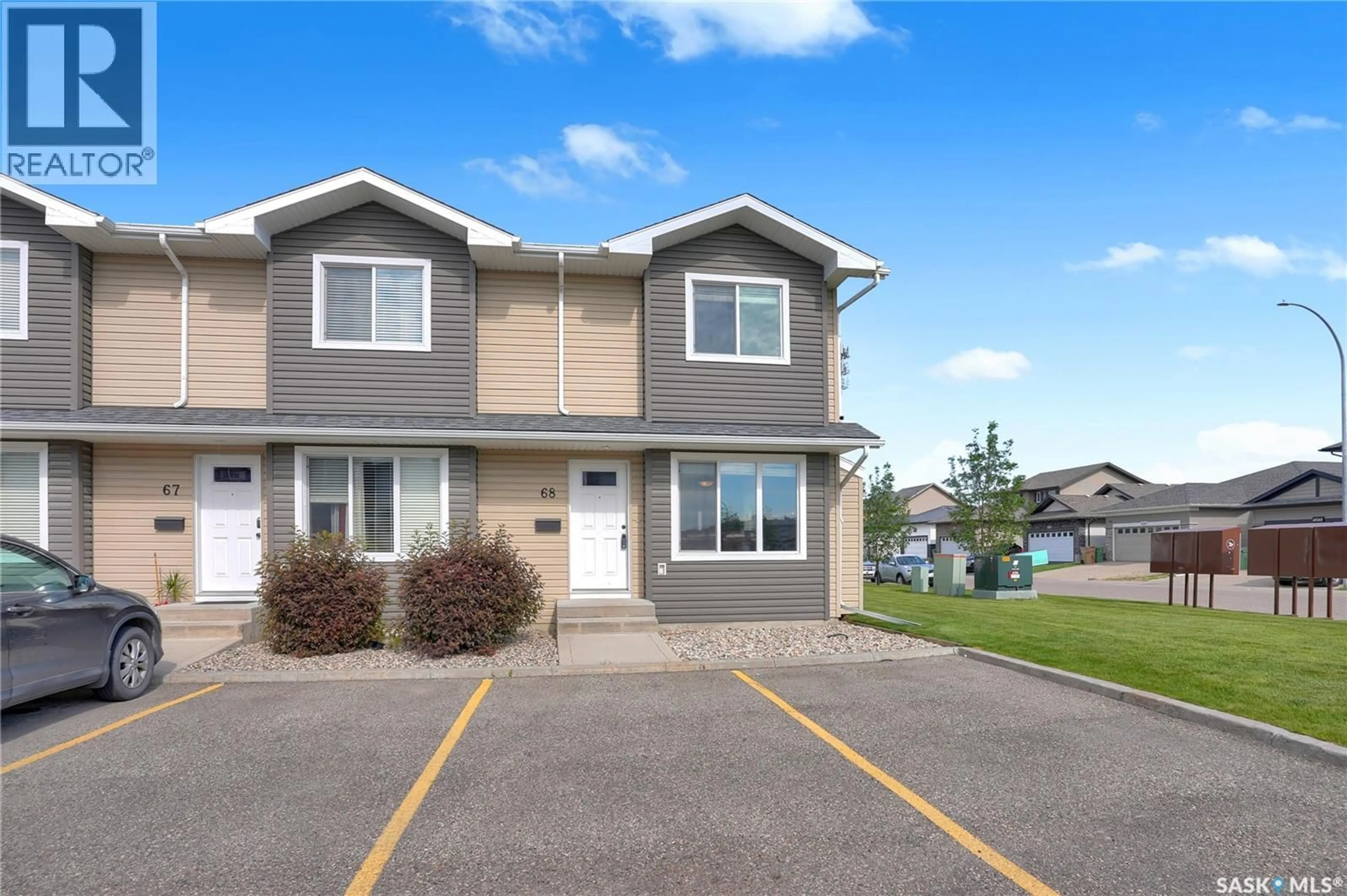 Home with vinyl exterior material, street for 68 - 4850 HARBOUR LANDING DRIVE, Regina Saskatchewan S4W0K9