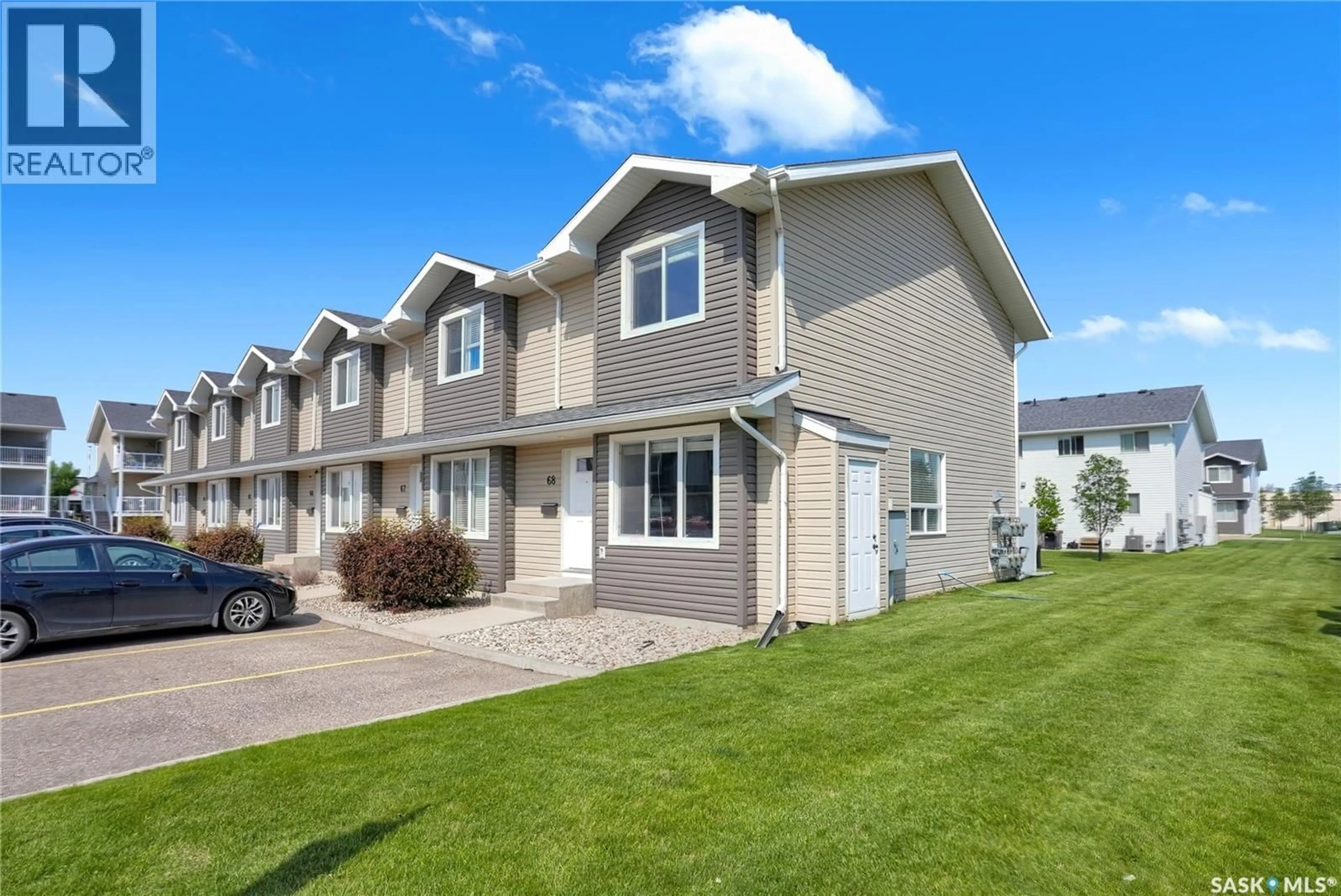 Home with vinyl exterior material, street for 68 - 4850 HARBOUR LANDING DRIVE, Regina Saskatchewan S4W0K9