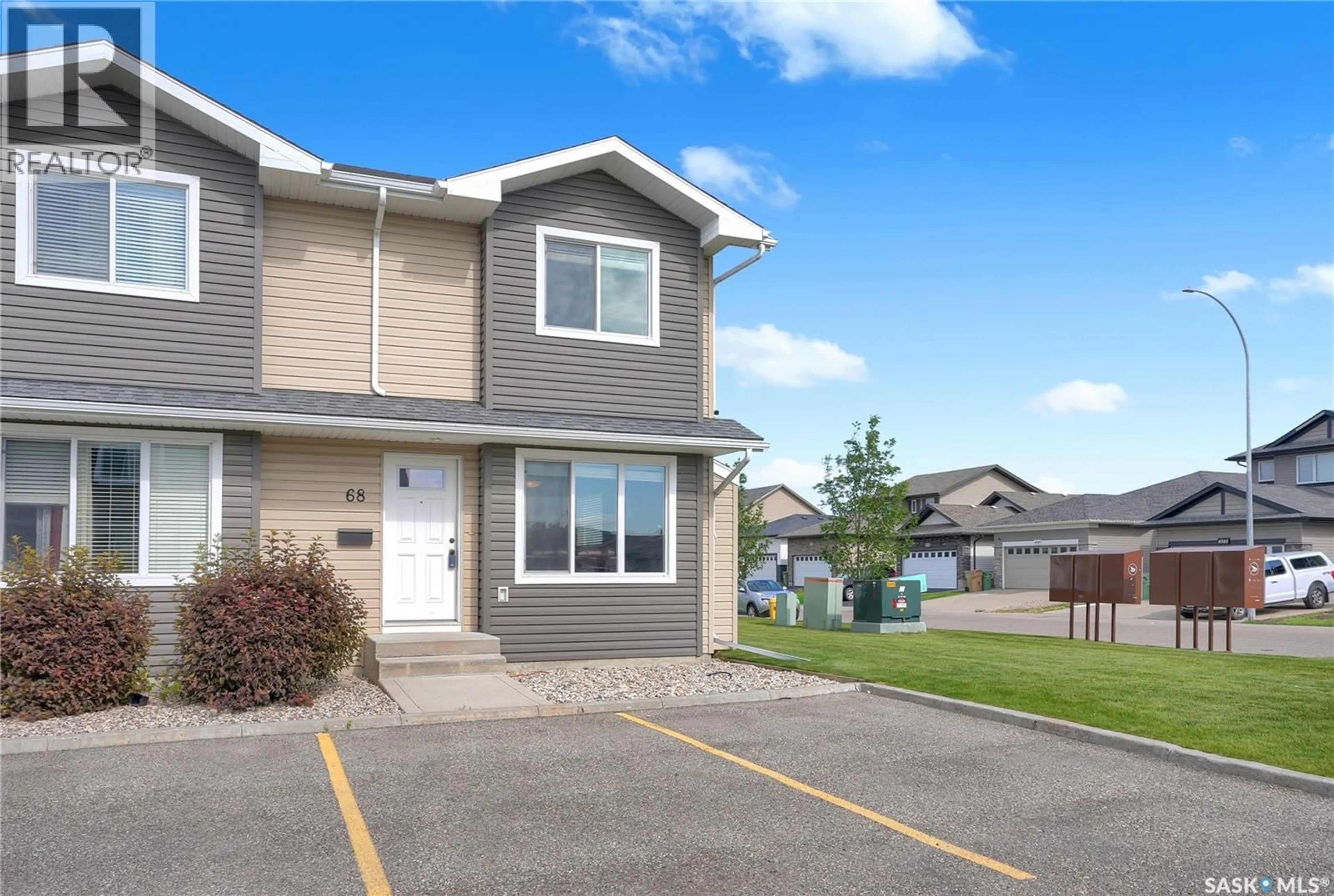 Home with vinyl exterior material, street for 68 - 4850 HARBOUR LANDING DRIVE, Regina Saskatchewan S4W0K9