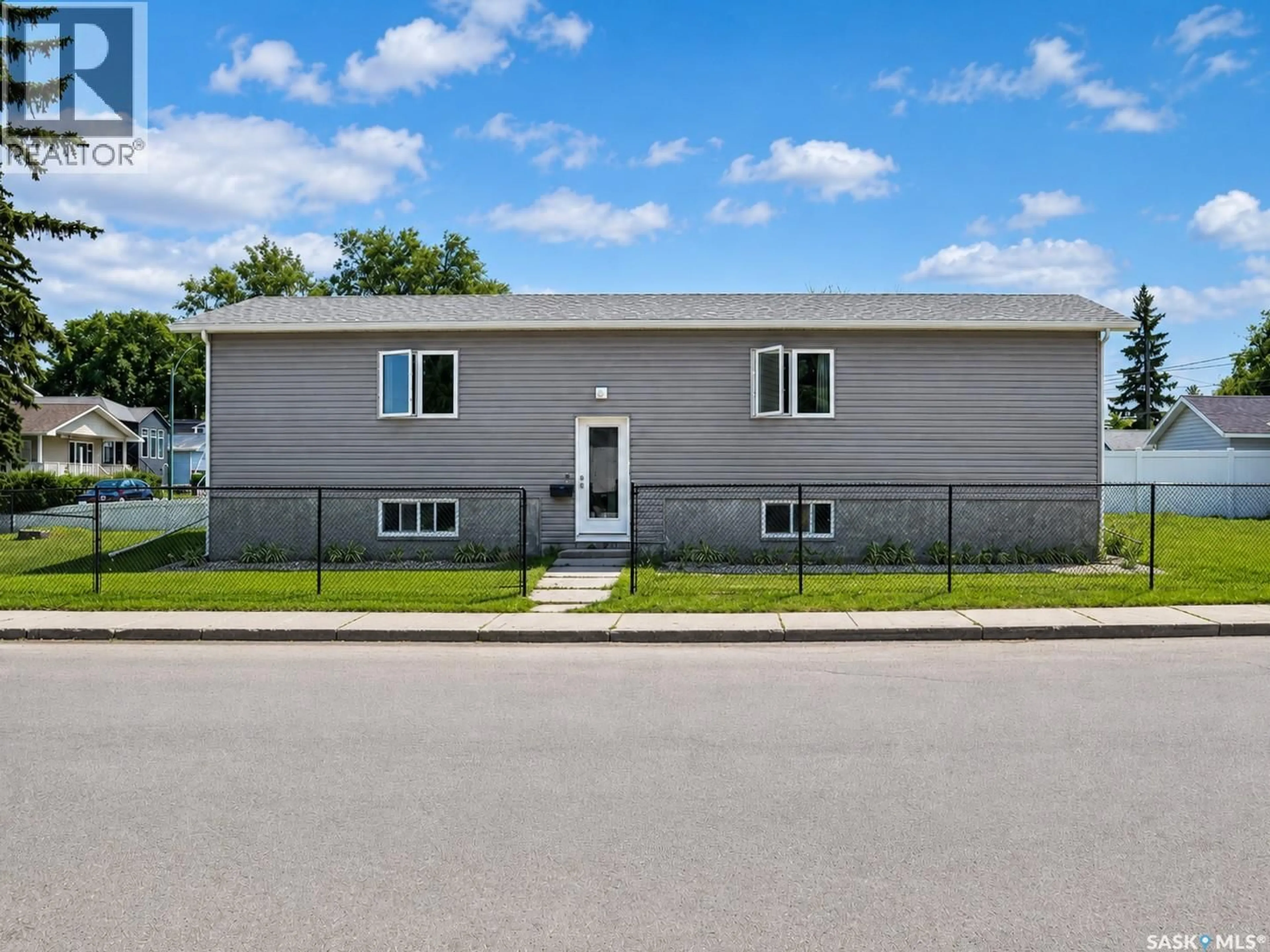 Home with vinyl exterior material, street for 2100 EDGAR STREET, Regina Saskatchewan S4N3K7