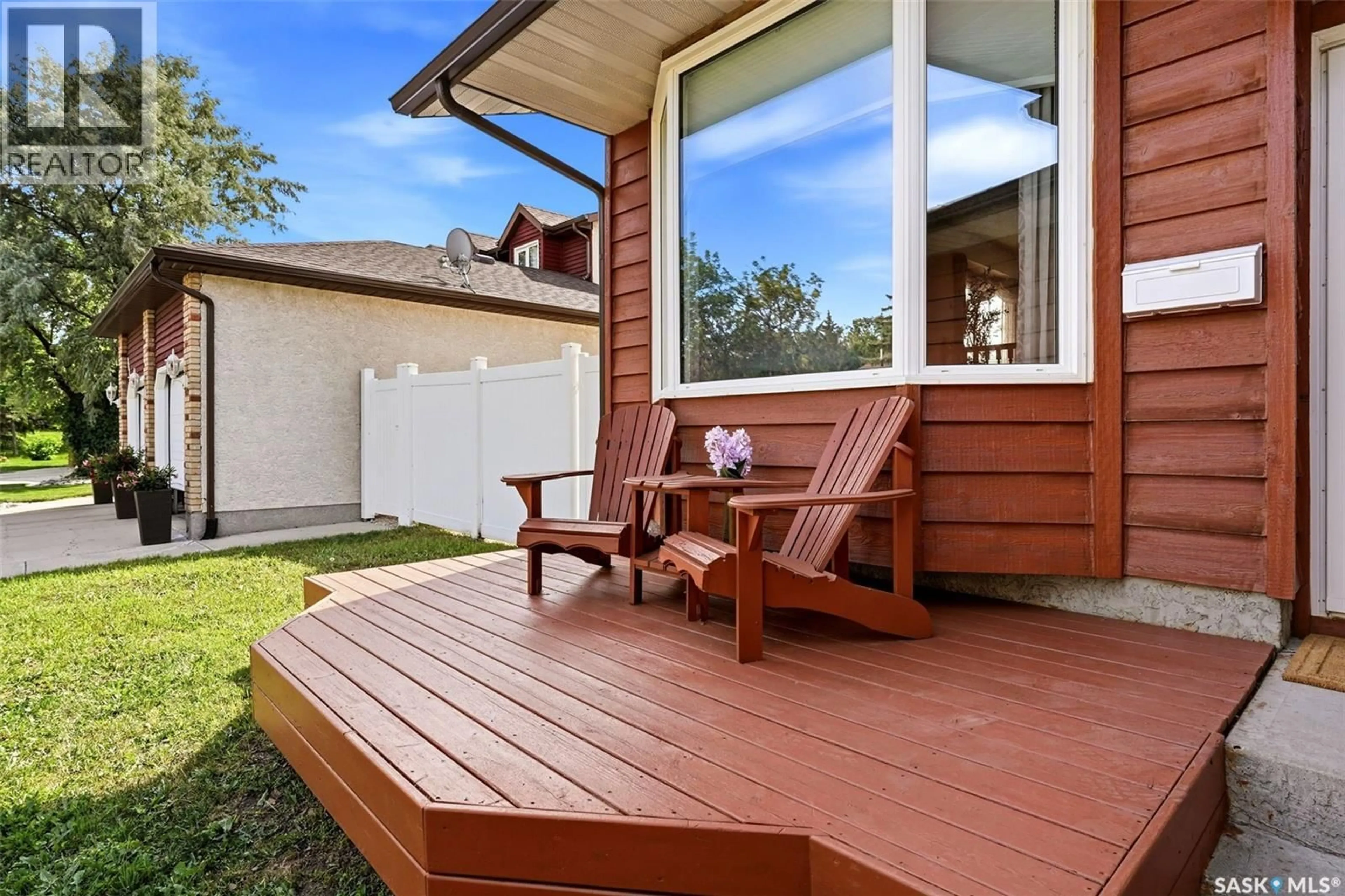 Home with vinyl exterior material, street for 2407 ROOKE PLACE, Regina Saskatchewan S4V1T7