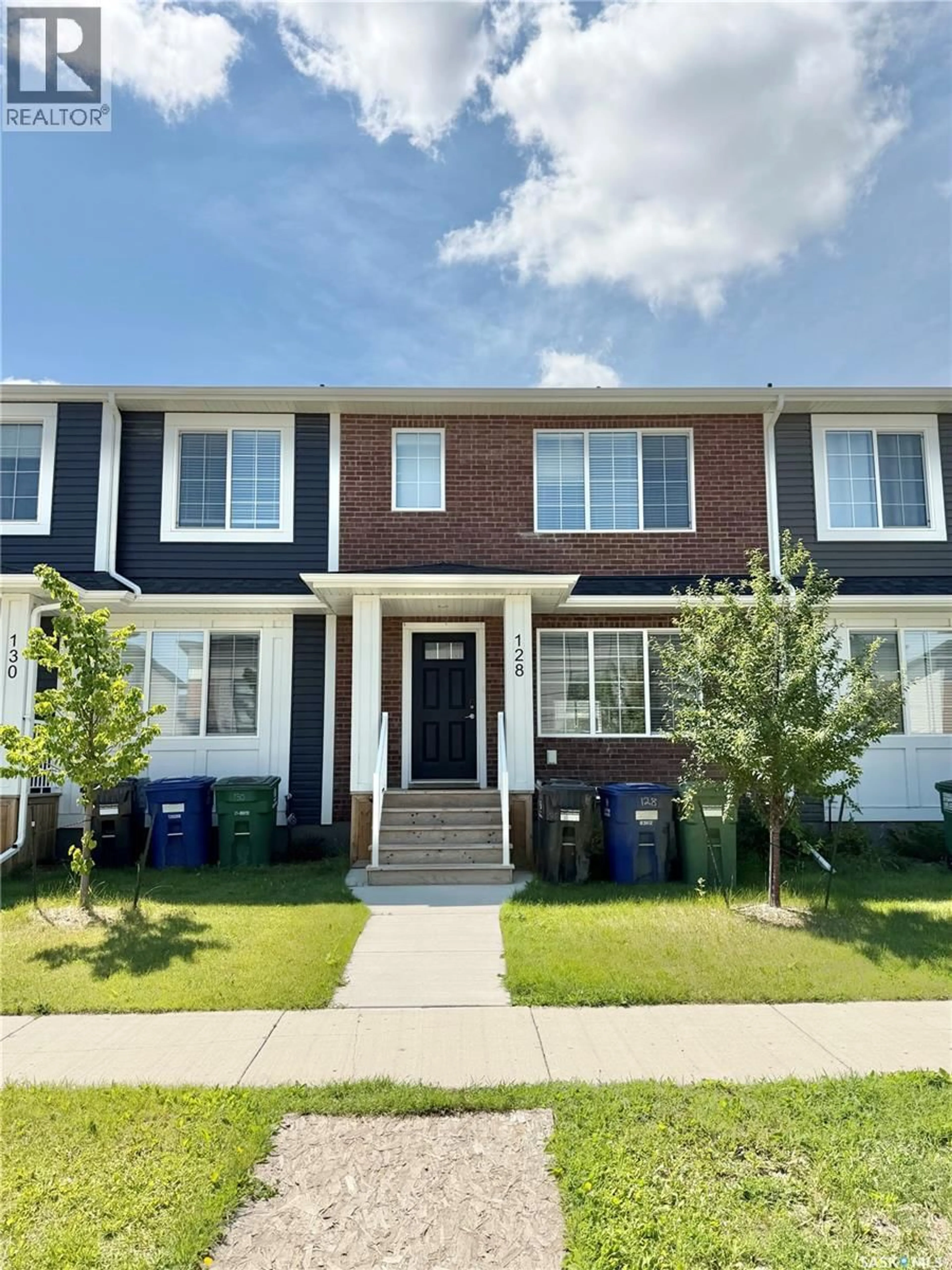 Home with brick exterior material, street for 128 WESTFIELD ROAD, Saskatoon Saskatchewan S7V0Z9