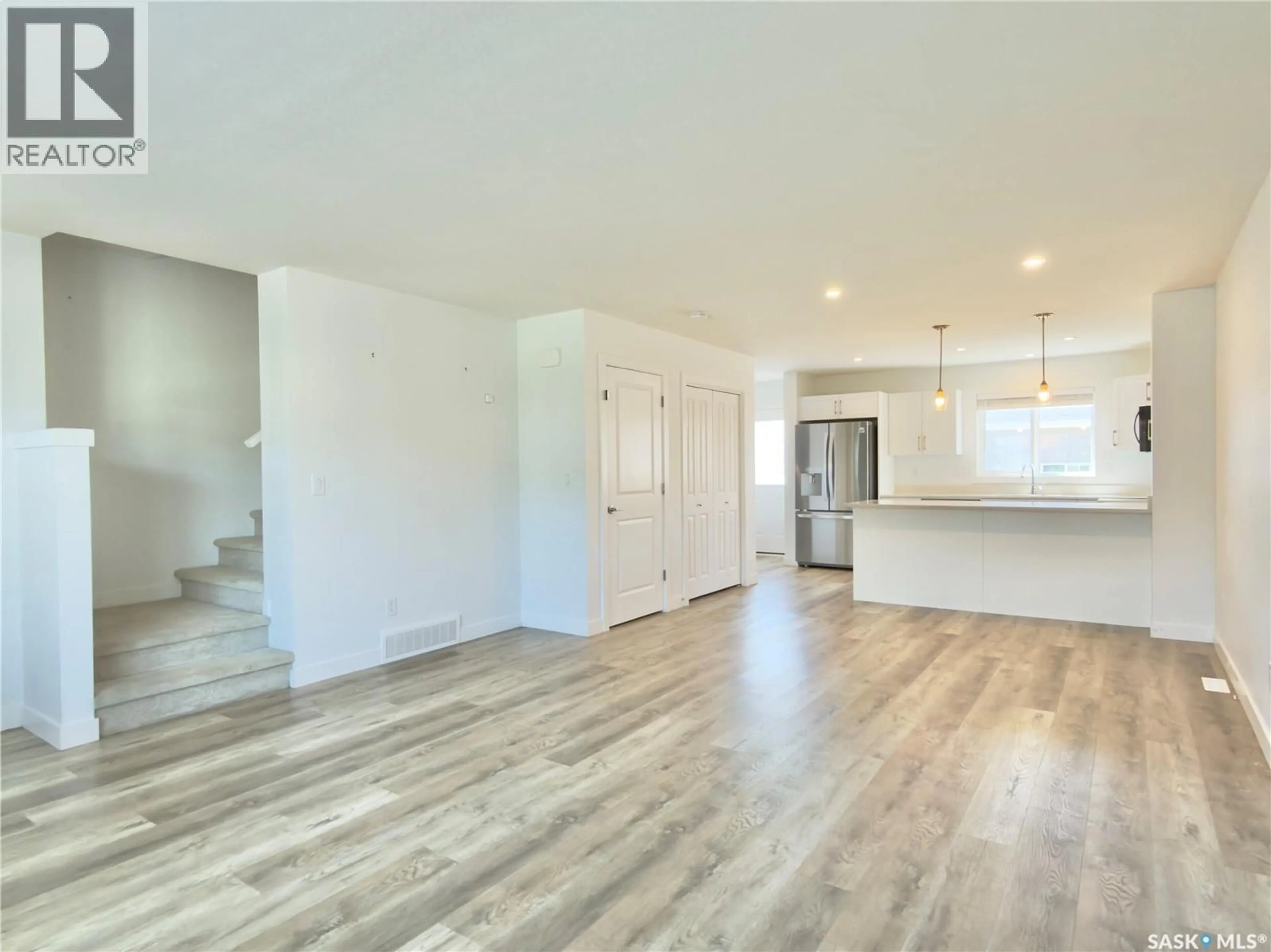 Open concept kitchen, unknown for 128 WESTFIELD ROAD, Saskatoon Saskatchewan S7V0Z9