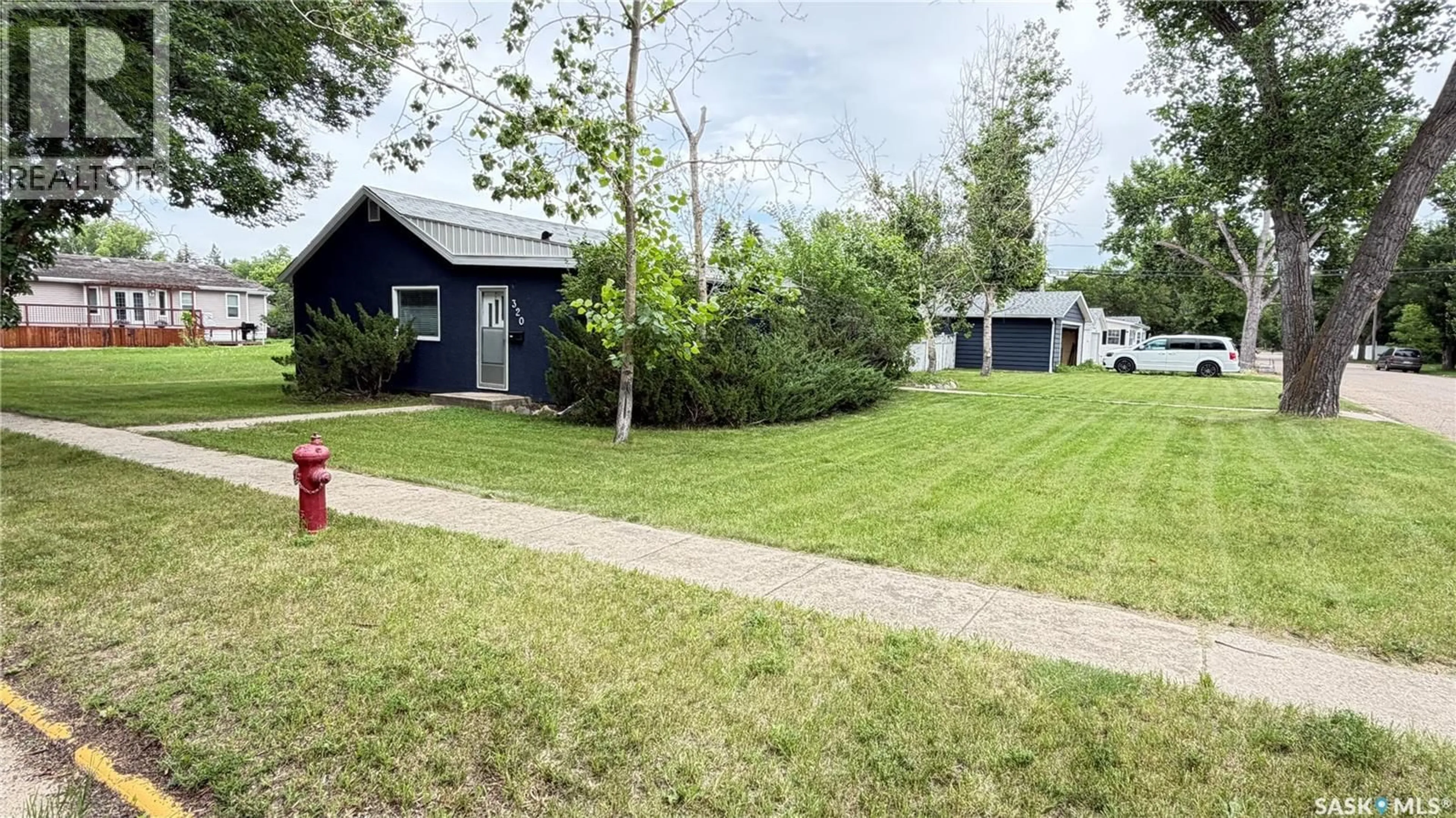 A pic from outside/outdoor area/front of a property/back of a property/a pic from drone, street for 320 ASPEN STREET, Maple Creek Saskatchewan S0N1N0