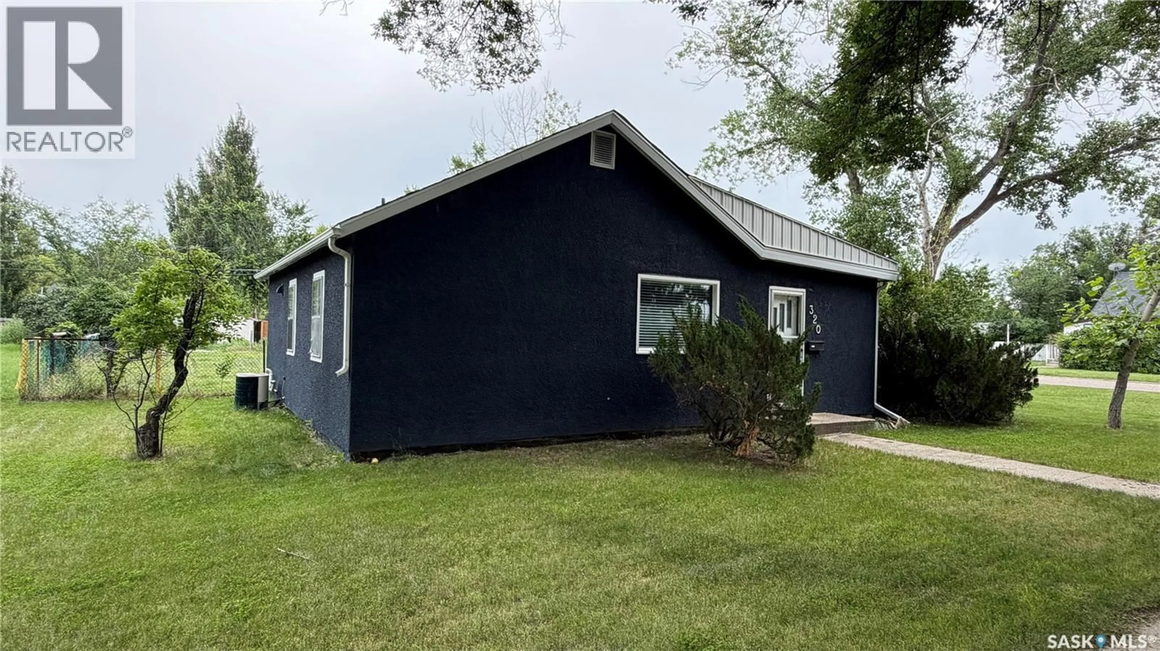 Home with vinyl exterior material, building for 320 ASPEN STREET, Maple Creek Saskatchewan S0N1N0