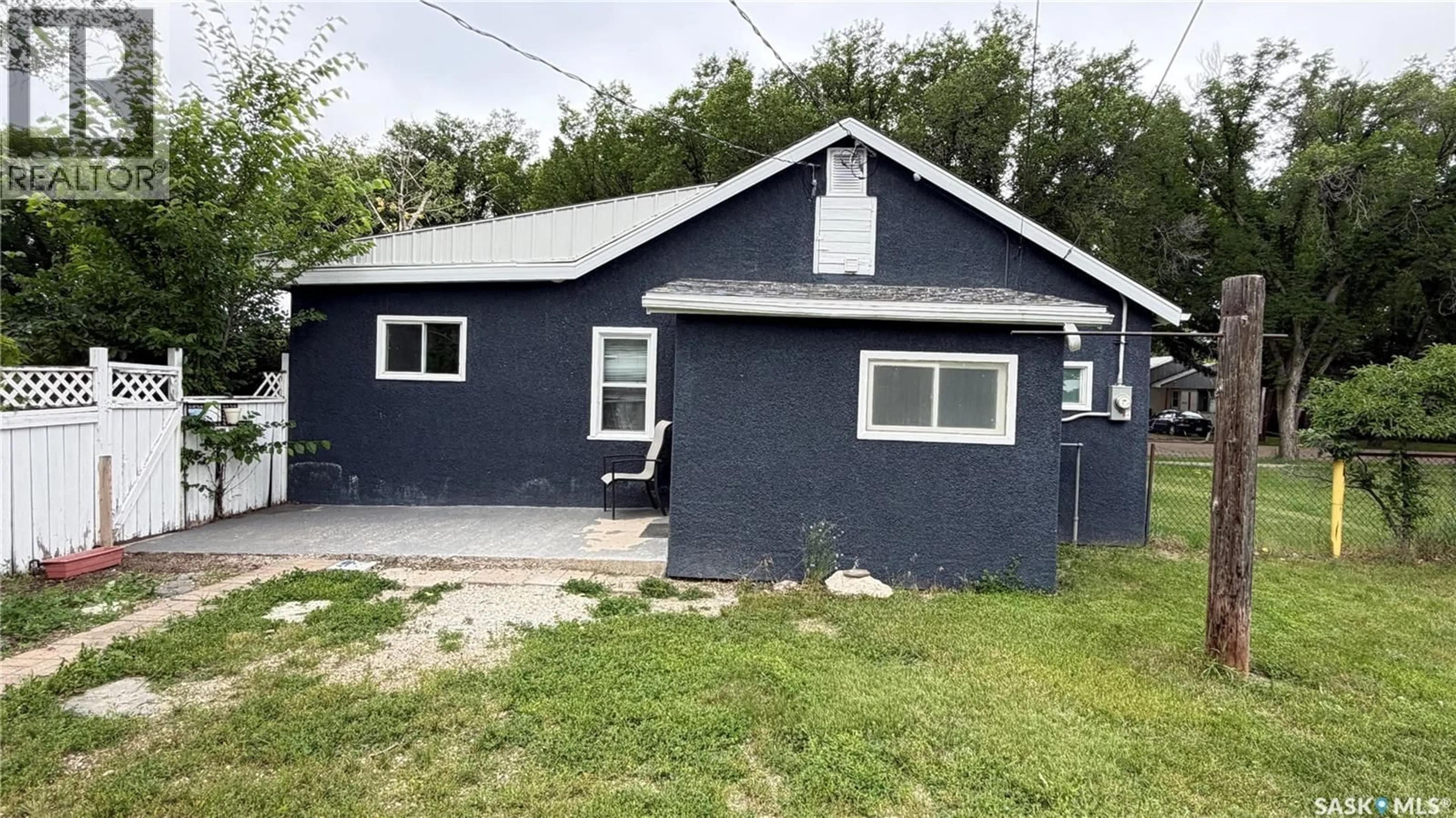 Home with vinyl exterior material, street for 320 ASPEN STREET, Maple Creek Saskatchewan S0N1N0