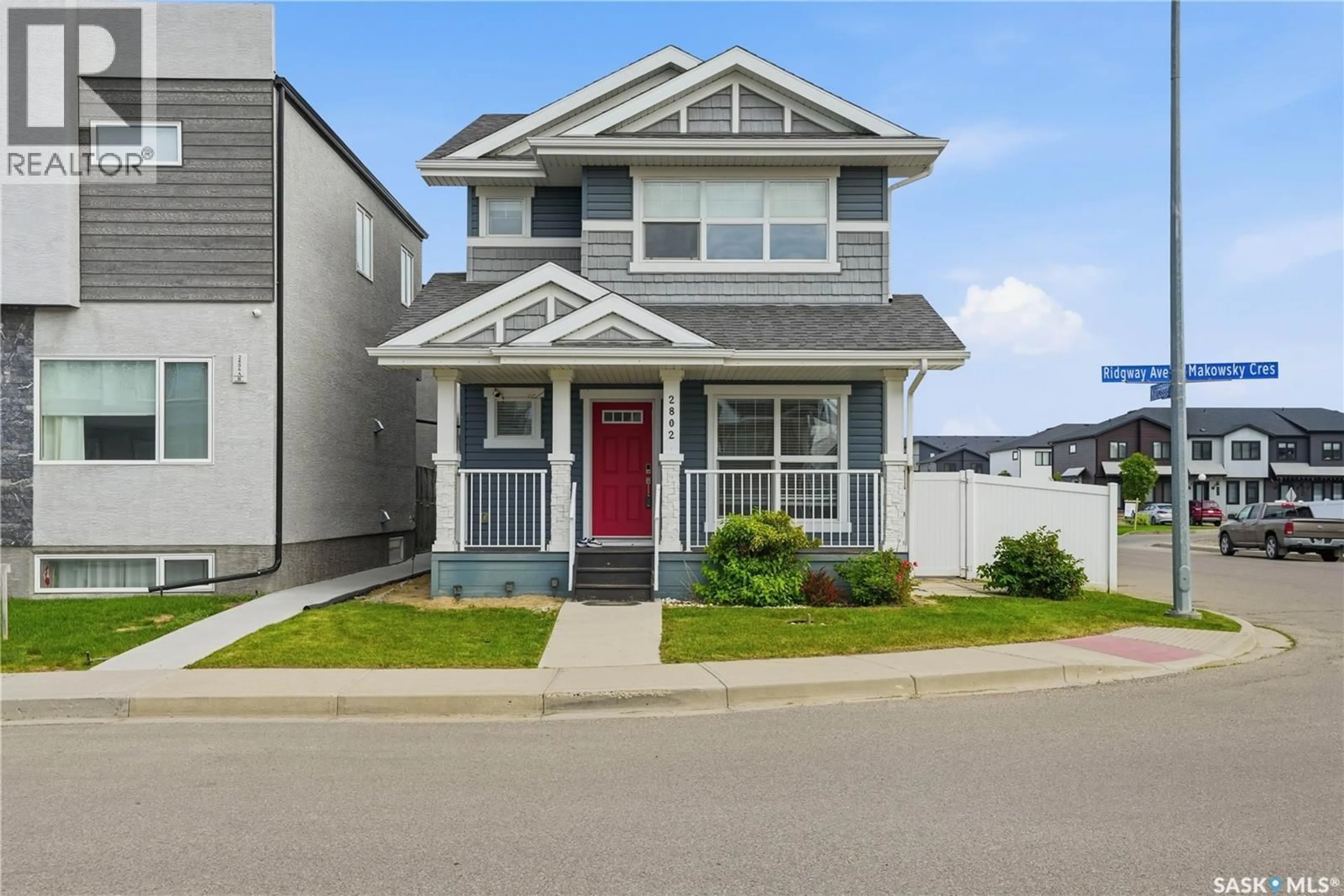Home with vinyl exterior material, street for 2802 RIDGWAY AVENUE, Regina Saskatchewan S4X0N1
