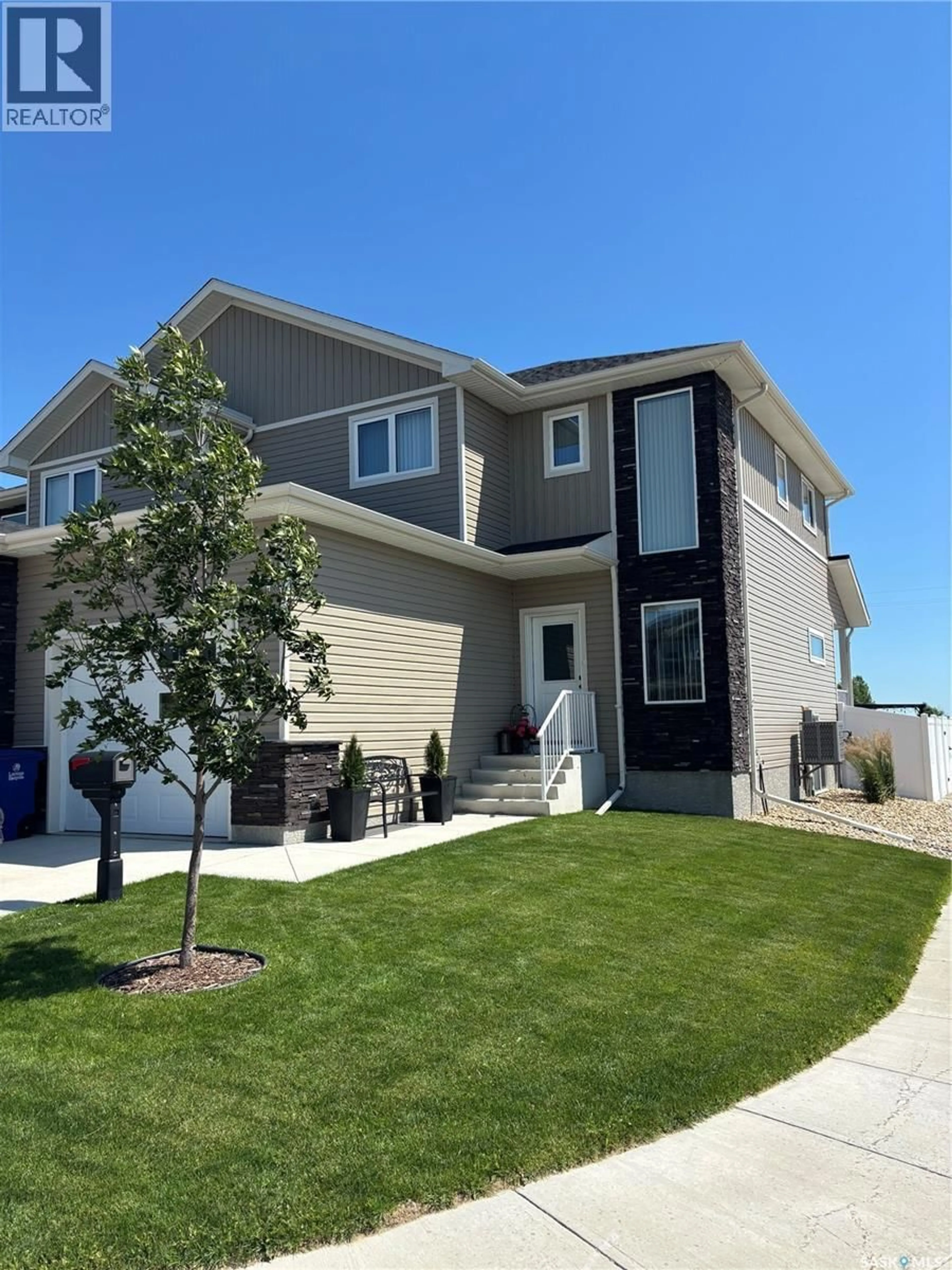 Home with vinyl exterior material, street for 101 ECHO LANE, Martensville Saskatchewan S0K2T1
