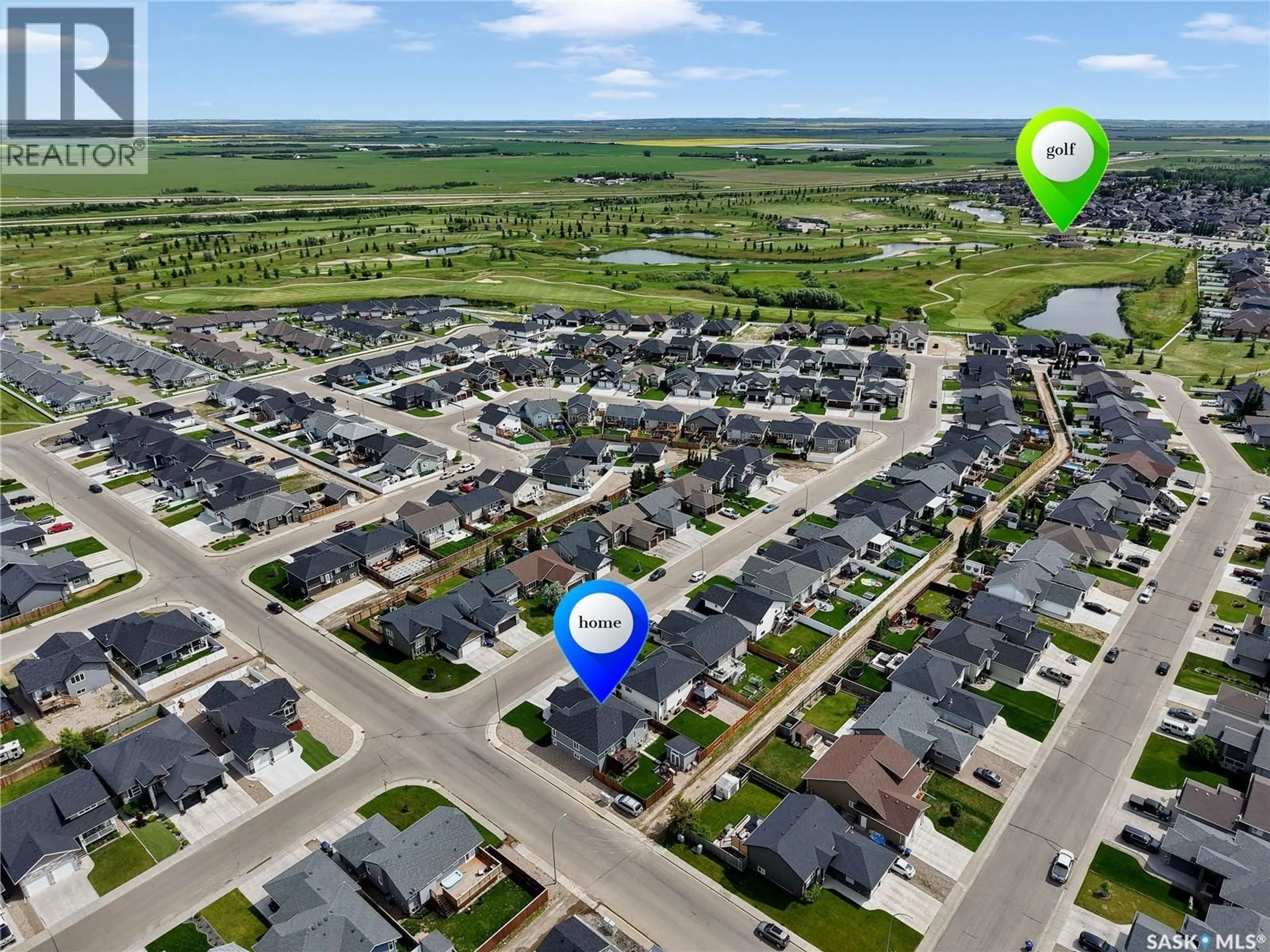 A pic from outside/outdoor area/front of a property/back of a property/a pic from drone, street for 537 MICKELSON LANE, Warman Saskatchewan S0K4S1