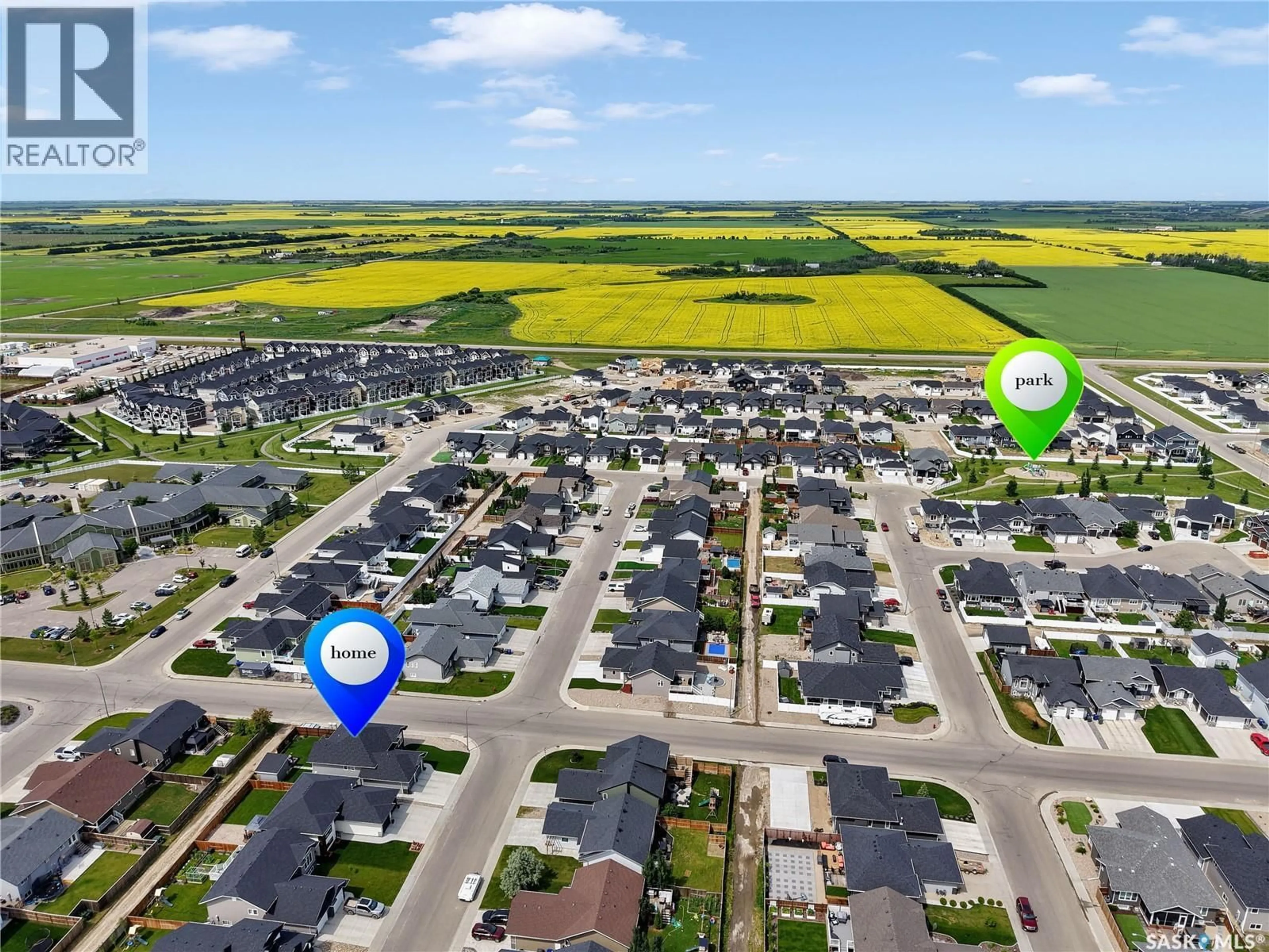 A pic from outside/outdoor area/front of a property/back of a property/a pic from drone, street for 537 MICKELSON LANE, Warman Saskatchewan S0K4S1