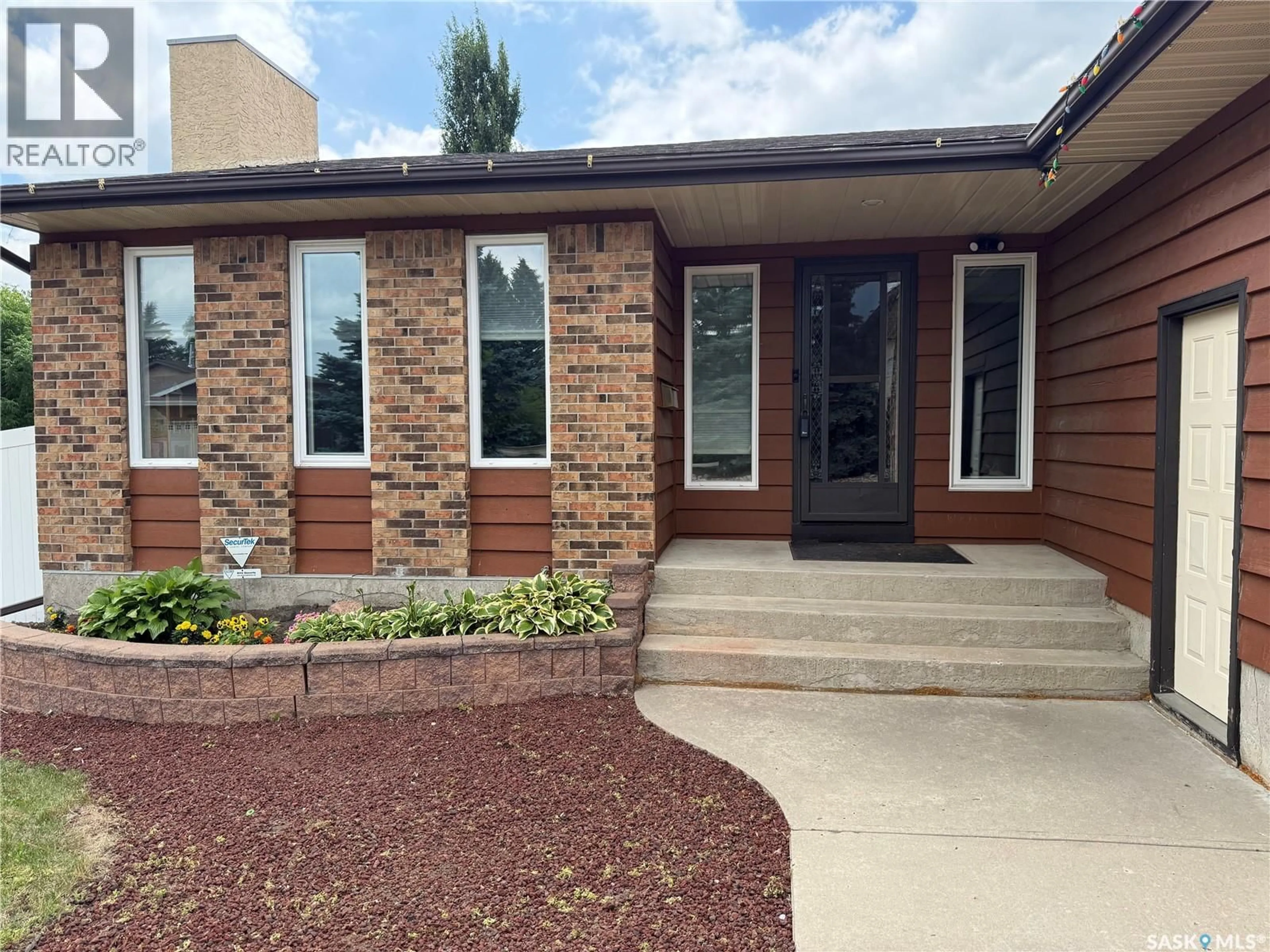 Home with brick exterior material, street for E - 2746 POPLAR PLACE, Regina Saskatchewan S4V1K8