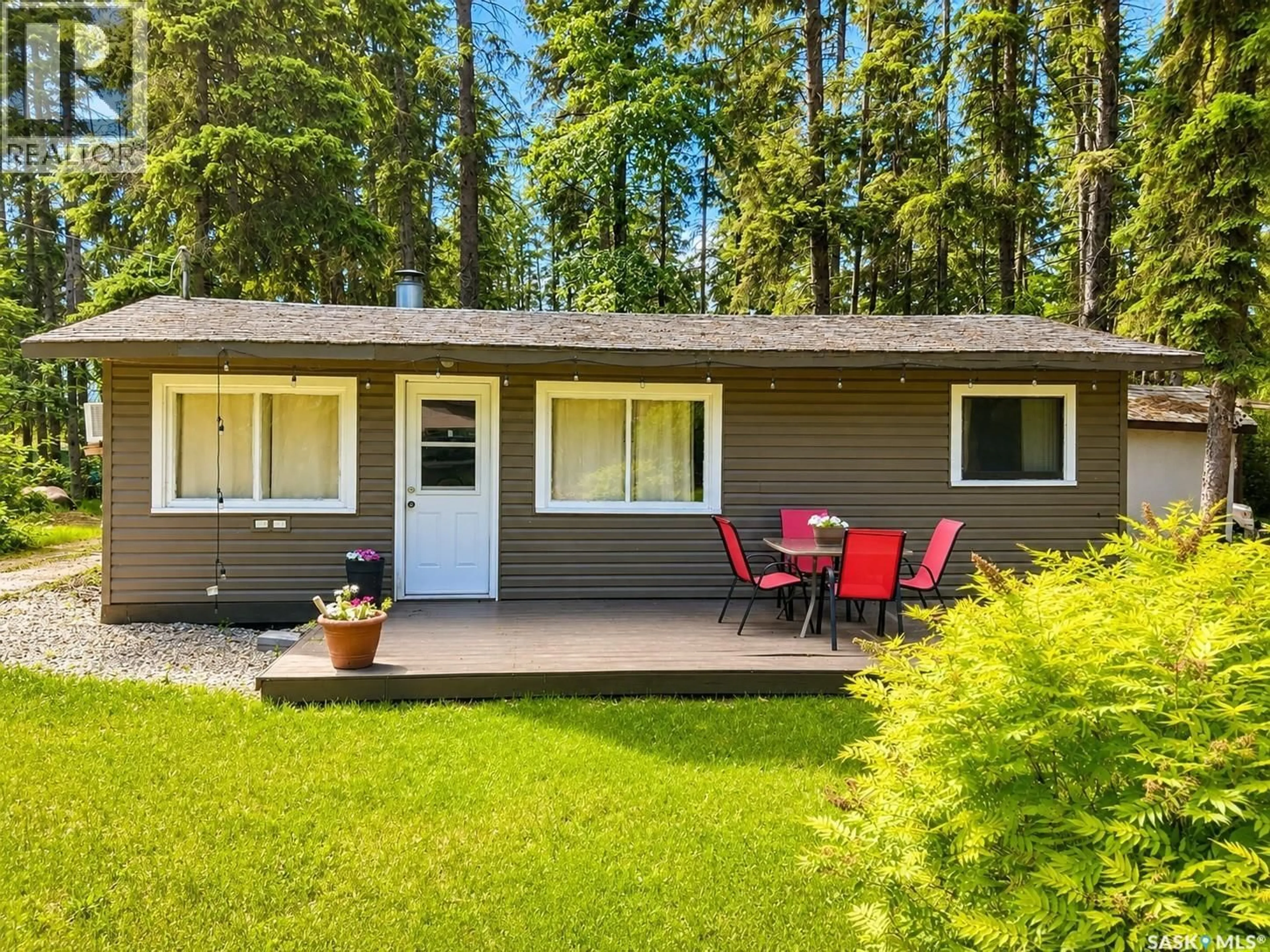 Home with vinyl exterior material, forest/trees view for Block 1 Lot 16 MEMORIAL LAKE, Shell Lake Saskatchewan S0J2G0