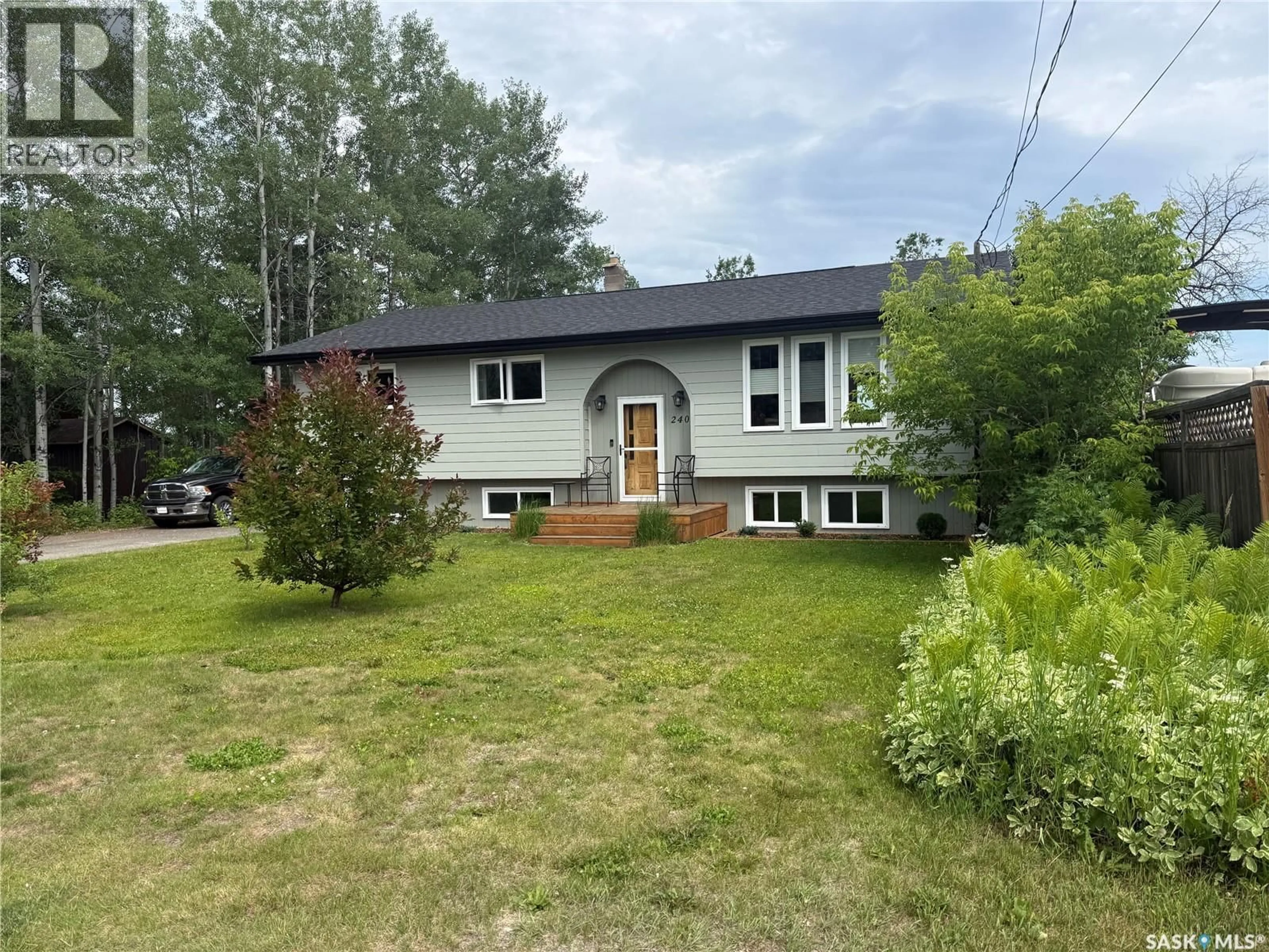 A pic from outside/outdoor area/front of a property/back of a property/a pic from drone, street for 240 DEHAVILLAND AVENUE, Air Ronge Saskatchewan S0J3G0