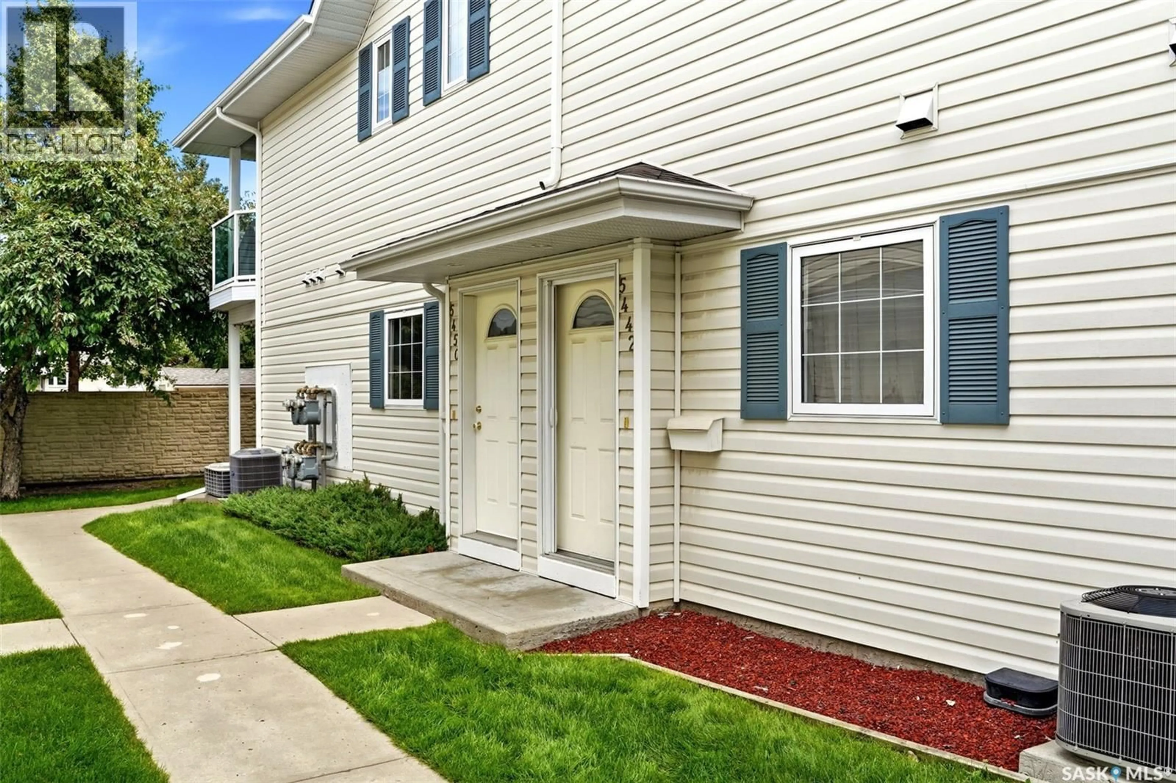 Home with vinyl exterior material, street for 5442 ROCHDALE BOULEVARD, Regina Saskatchewan S4X4P1