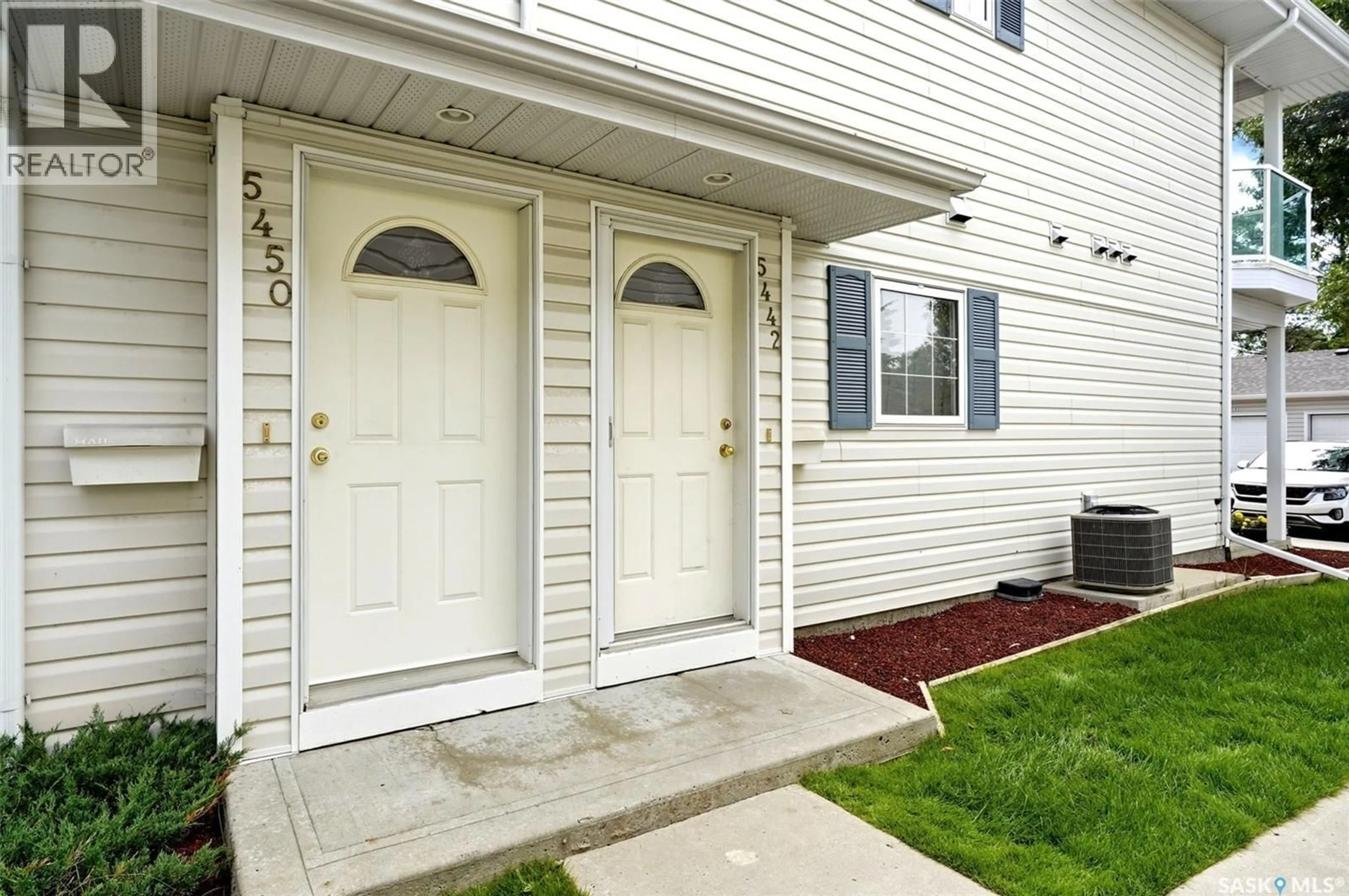 Home with vinyl exterior material, street for 5442 ROCHDALE BOULEVARD, Regina Saskatchewan S4X4P1