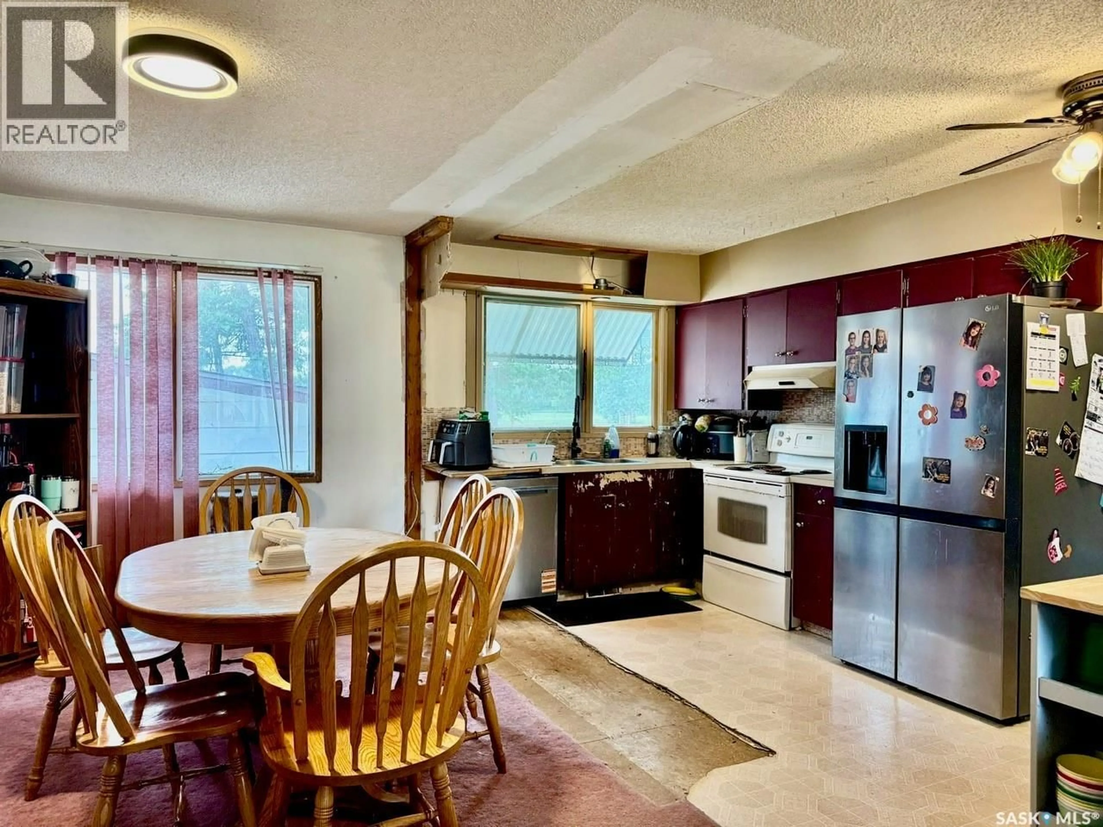 Open concept kitchen, ceramic/tile floor for 11 VETSHOME DRIVE, Lanigan Saskatchewan S0K2M0