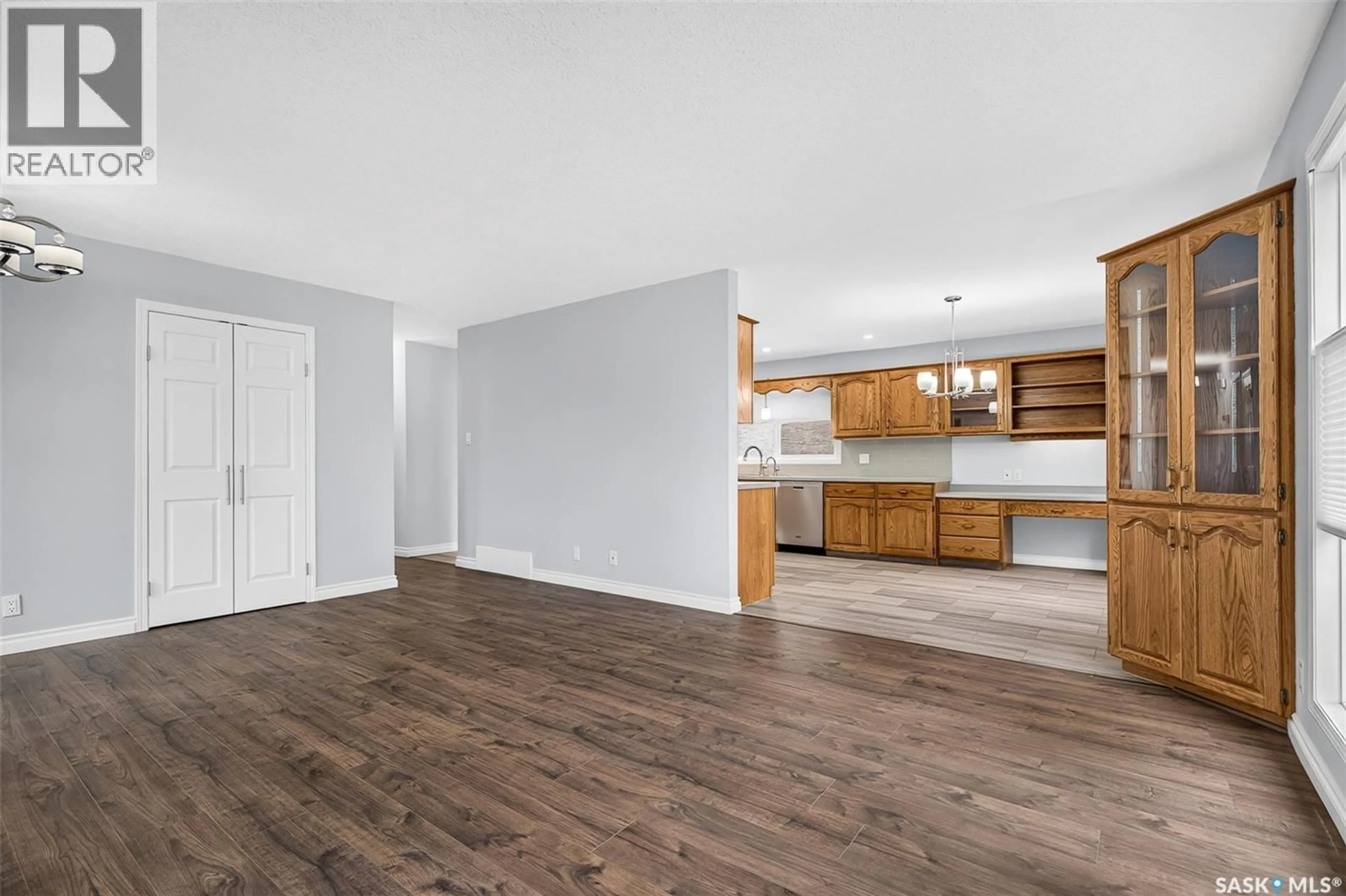 Open concept kitchen, wood/laminate floor for 1027 VAUGHAN STREET, Moose Jaw Saskatchewan S6H5P1