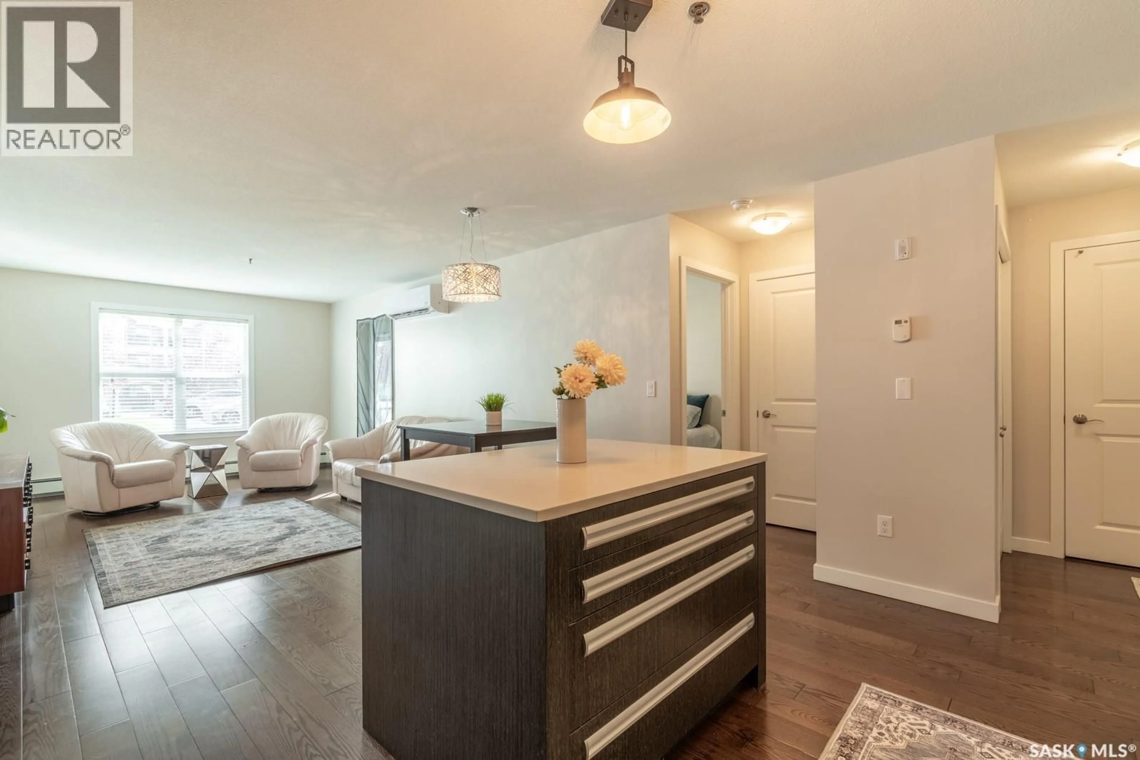 Open concept kitchen, wood/laminate floor for 1510 - 116 NEVILLE DRIVE, Regina Saskatchewan S4Z0A3