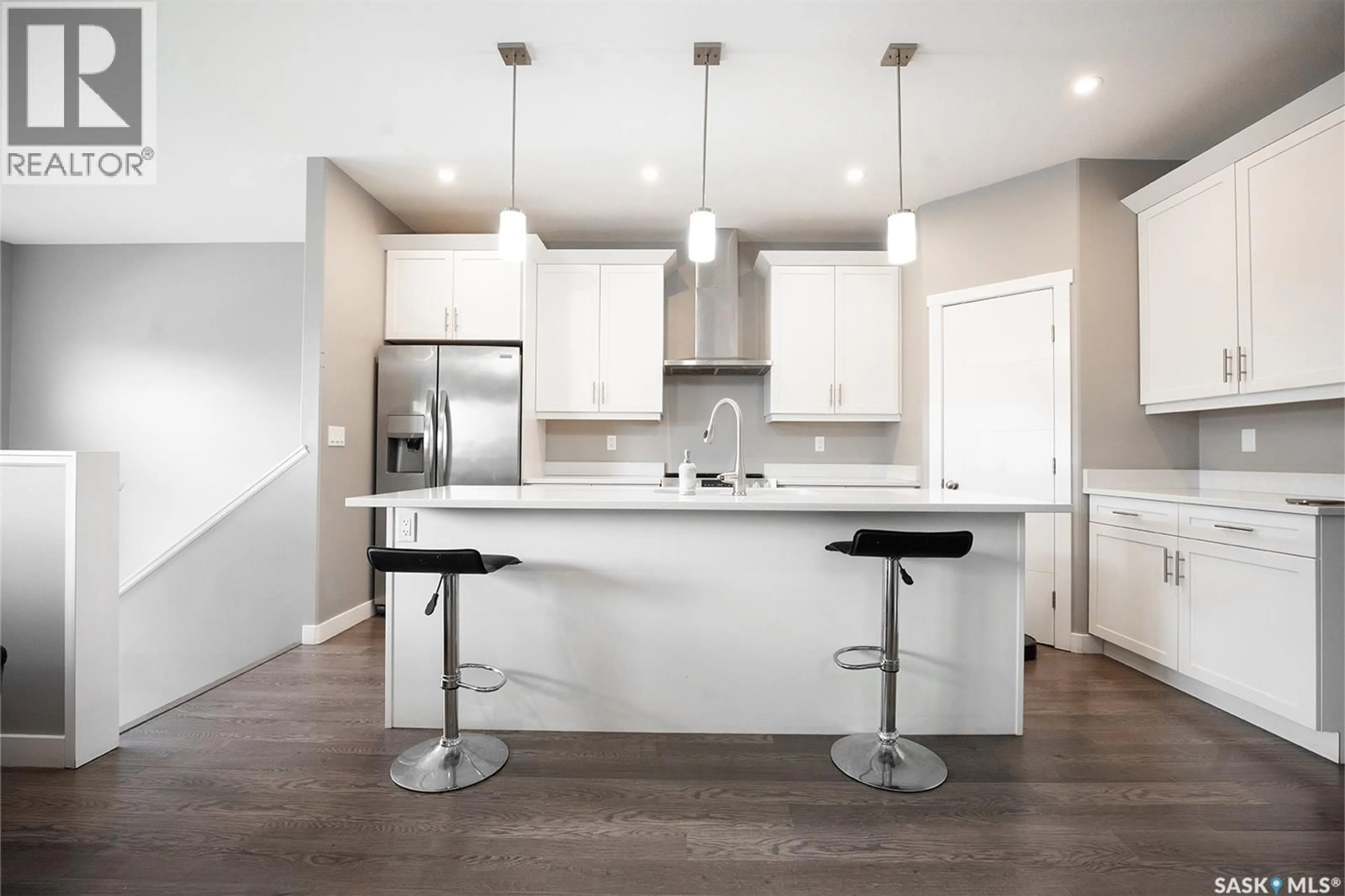 Open concept kitchen, unknown for 415 MCARTHUR CRESCENT, Saskatoon Saskatchewan S7L6Y3