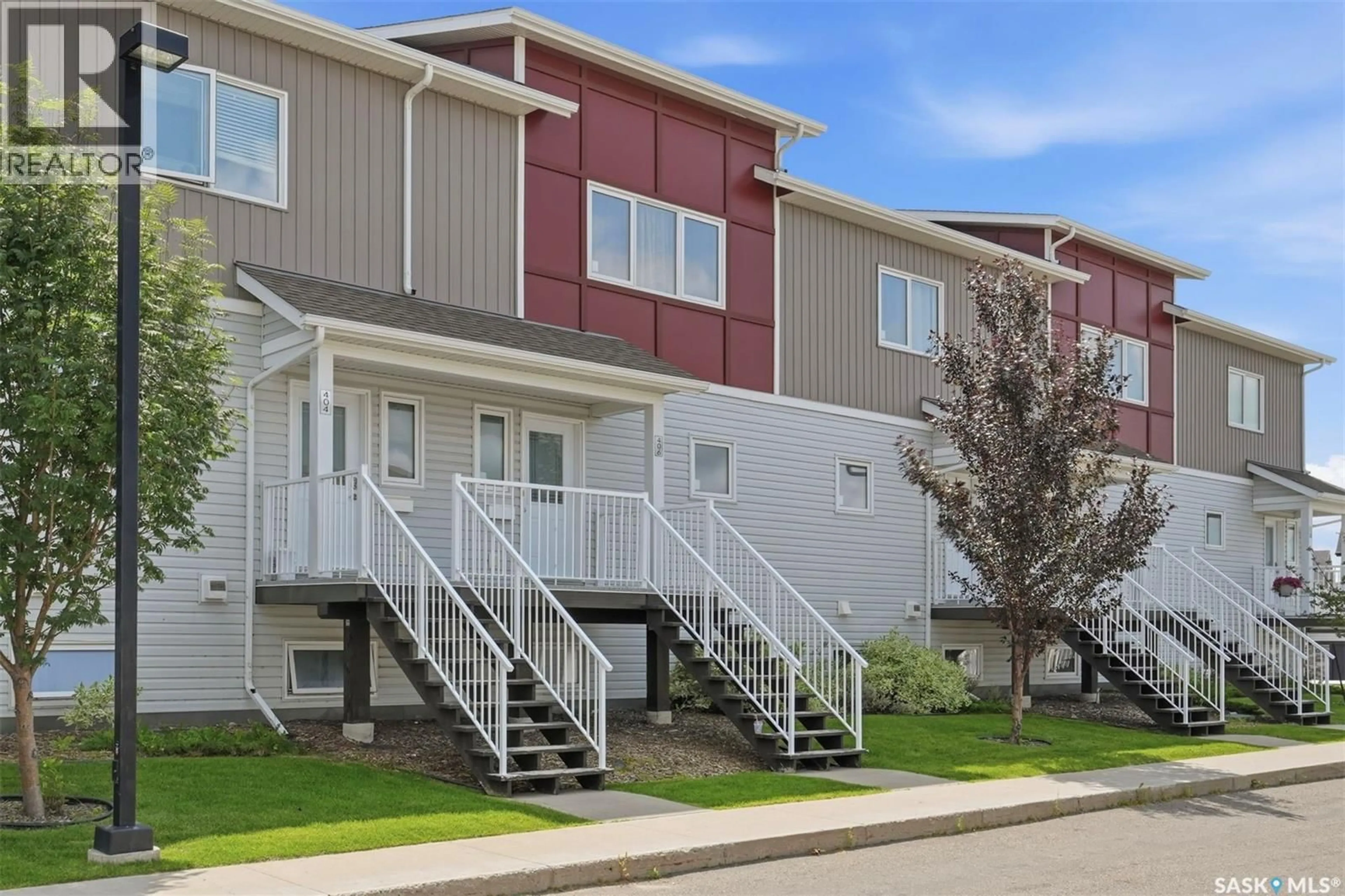 Home with vinyl exterior material, street for 225 - 406 HASSARD CLOSE, Saskatoon Saskatchewan S7L2W8
