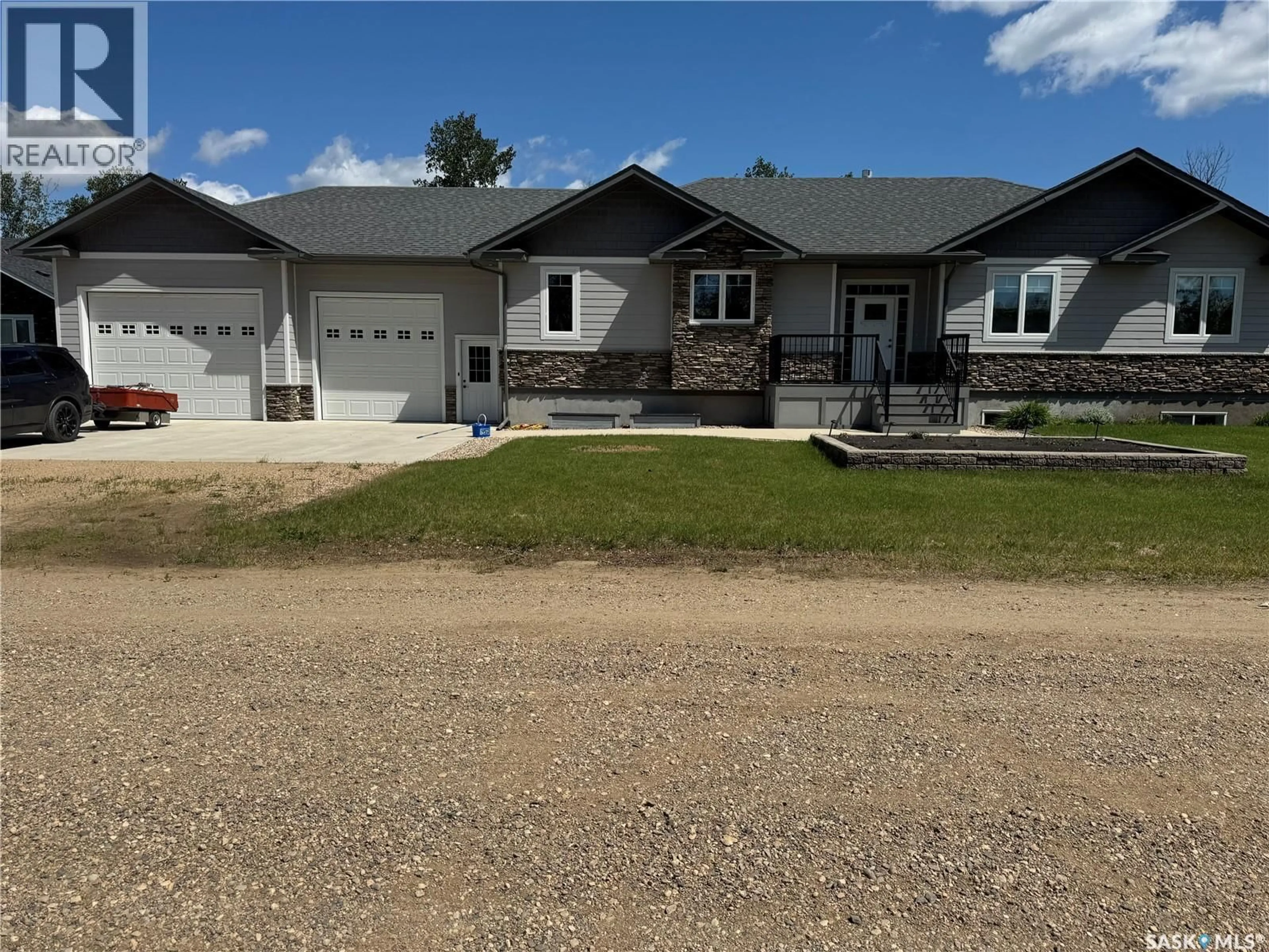 Home with vinyl exterior material, street for 214 HILLSIDE DRIVE, Tobin Lake Saskatchewan S0E1E0
