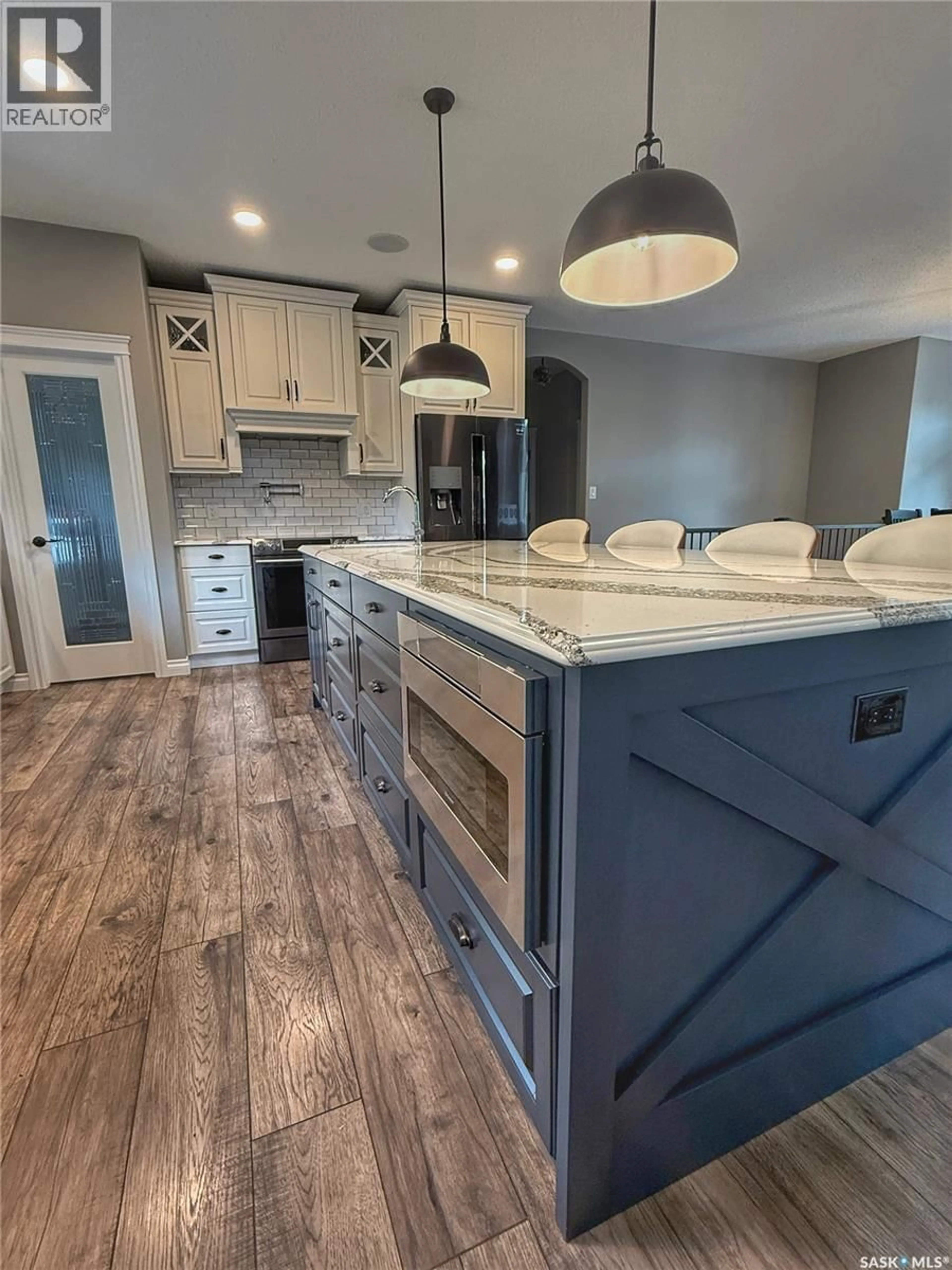 Open concept kitchen, ceramic/tile floor for 214 HILLSIDE DRIVE, Tobin Lake Saskatchewan S0E1E0
