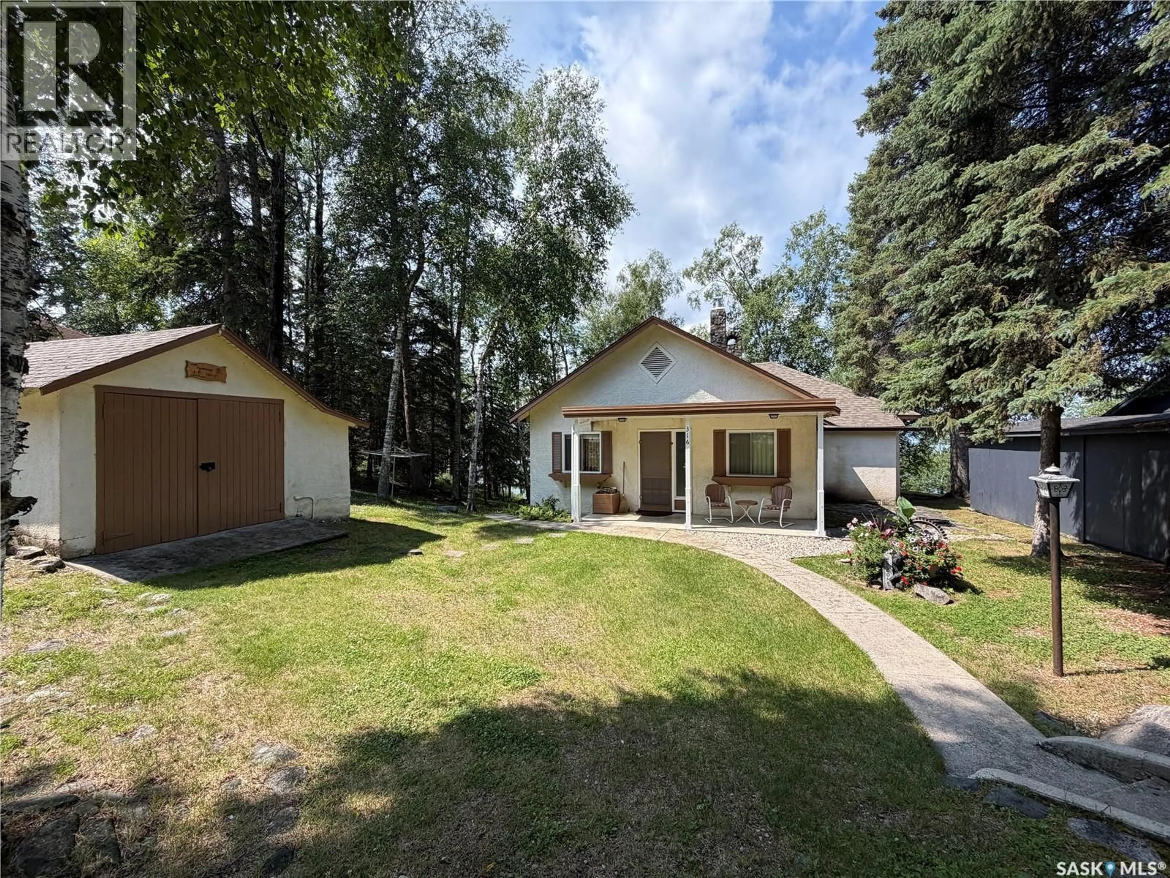 A pic from outside/outdoor area/front of a property/back of a property/a pic from drone, unknown for 316 PROSPECT DRIVE, Prince Albert National Park Saskatchewan S0J2Y0