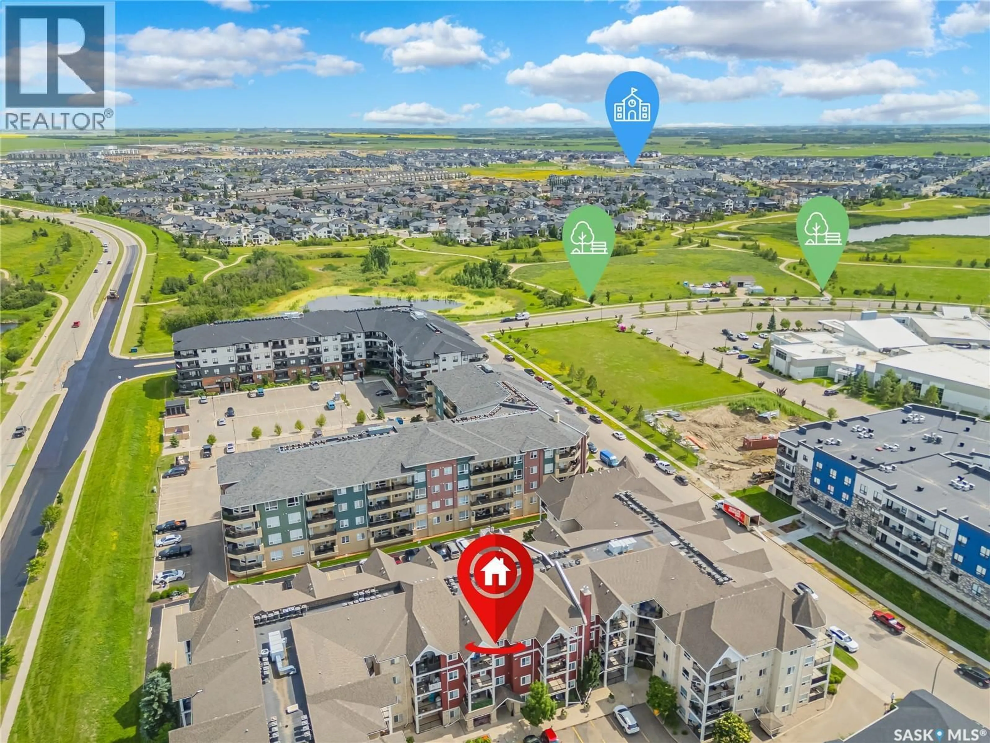 A pic from outside/outdoor area/front of a property/back of a property/a pic from drone, unknown for 103 150 PAWLYCHENKO LANE, Saskatoon Saskatchewan S7V0B4
