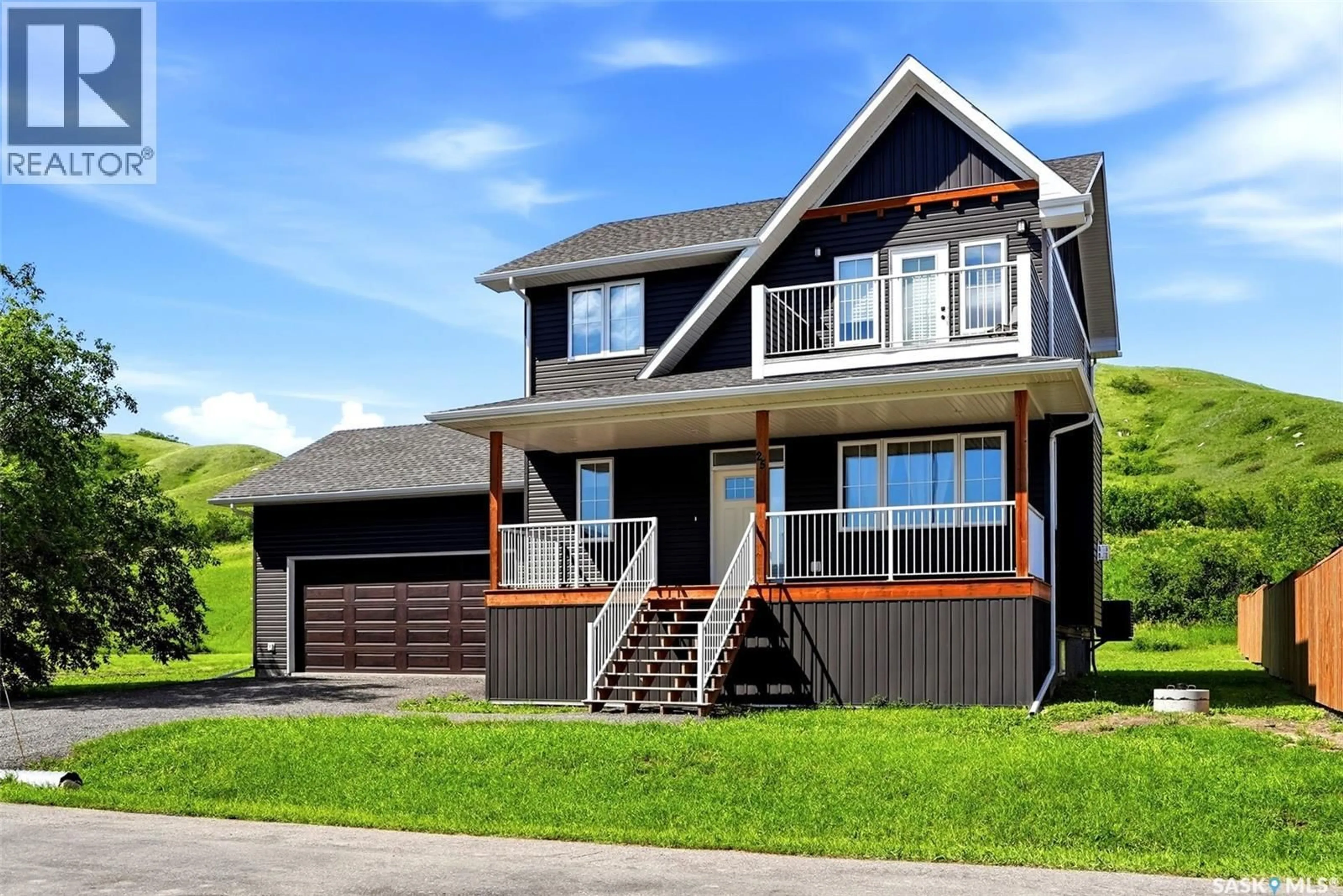 Home with vinyl exterior material, street for 25 AARON DRIVE, Echo Lake Saskatchewan S0G1S0